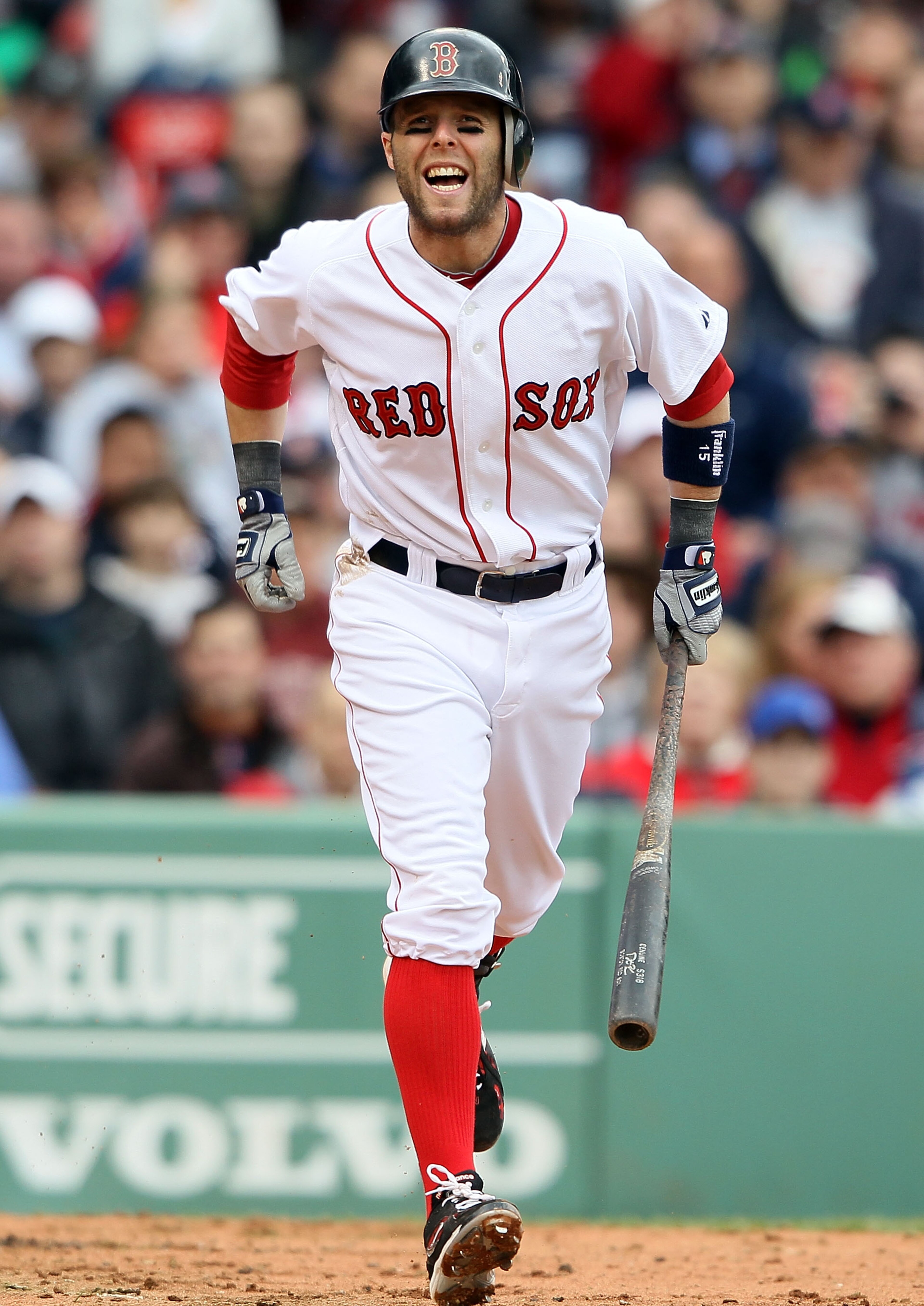 BOSTON - MAY 12:  Dustin Pedroia #15 of the Boston Red Sox heads to first base after getting hit by a pitch in the thrid inning against the Toronto Blue Jays on May 12, 2010 at Fenway Park in Boston, Massachusetts.  (Photo by Elsa/Getty Images)