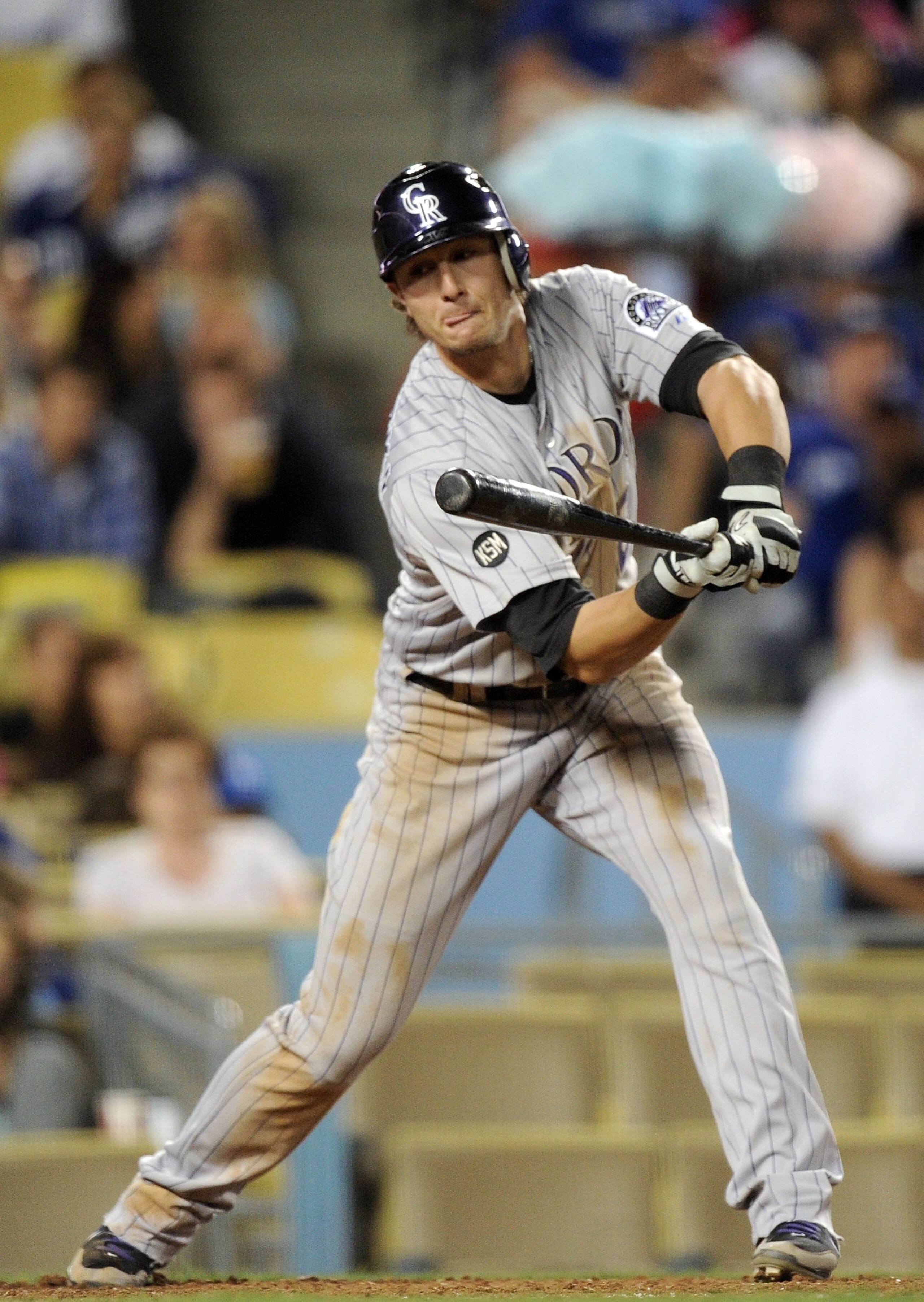 LOS ANGELES, CA - MAY 07:  Troy Tulowitzki #2 of the Colorado Rockies makes a check swing against the Los Angeles Dodgers at Dodger Stadium on May 7, 2010 in Los Angeles, California.  (Photo by Harry How/Getty Images)
