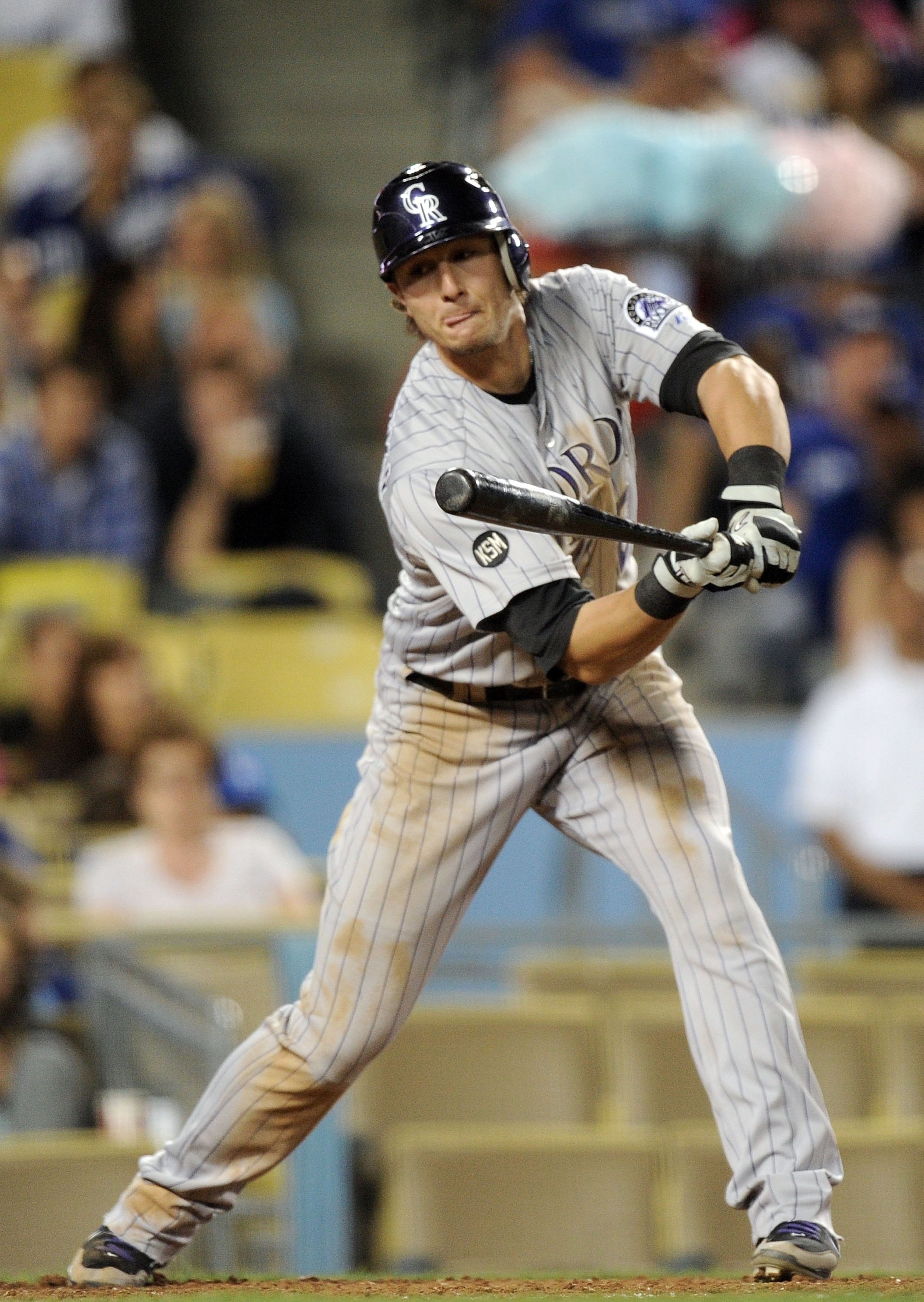 LOS ANGELES, CA - MAY 07:  Troy Tulowitzki #2 of the Colorado Rockies makes a check swing against the Los Angeles Dodgers at Dodger Stadium on May 7, 2010 in Los Angeles, California.  (Photo by Harry How/Getty Images)
