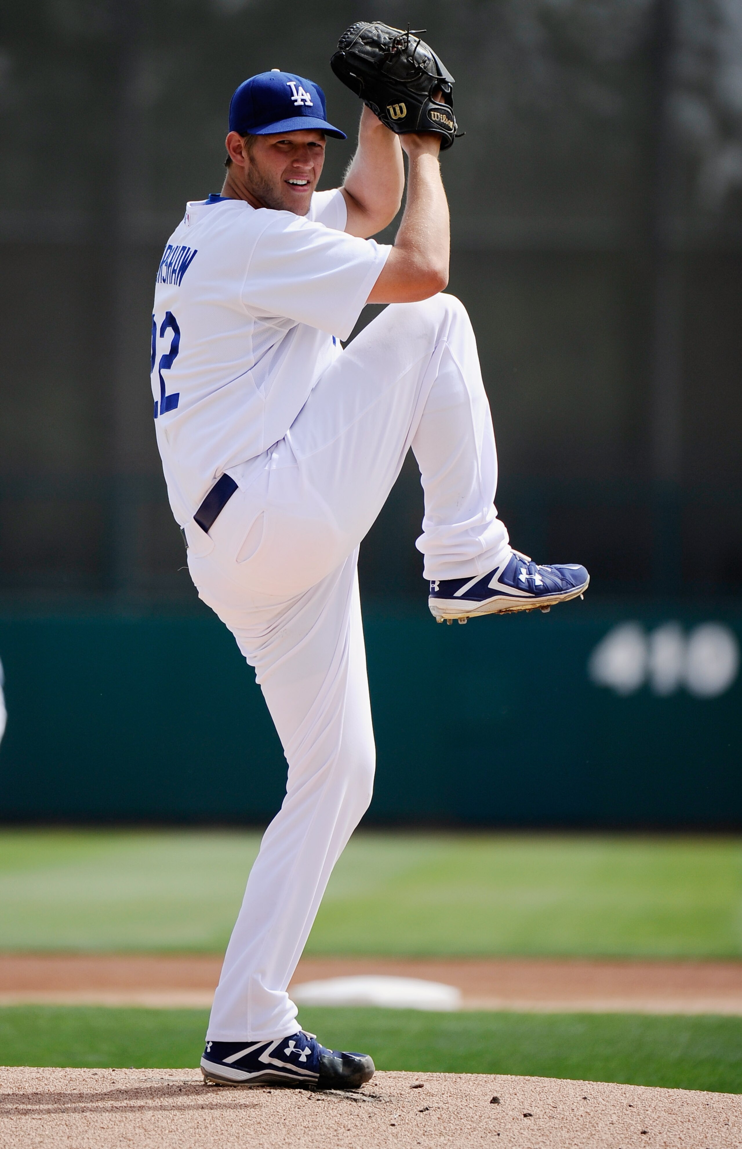 GLENDALE, AZ - MARCH 15:  Pitcher Clayton Kershaw #22 of the Los Angeles Dodgers throws a pitch against Texas Rangers during the spring training baseball game at Camelback Ranch on March 15, 2011 in Glendale, Arizona.  (Photo by Kevork Djansezian/Getty Im
