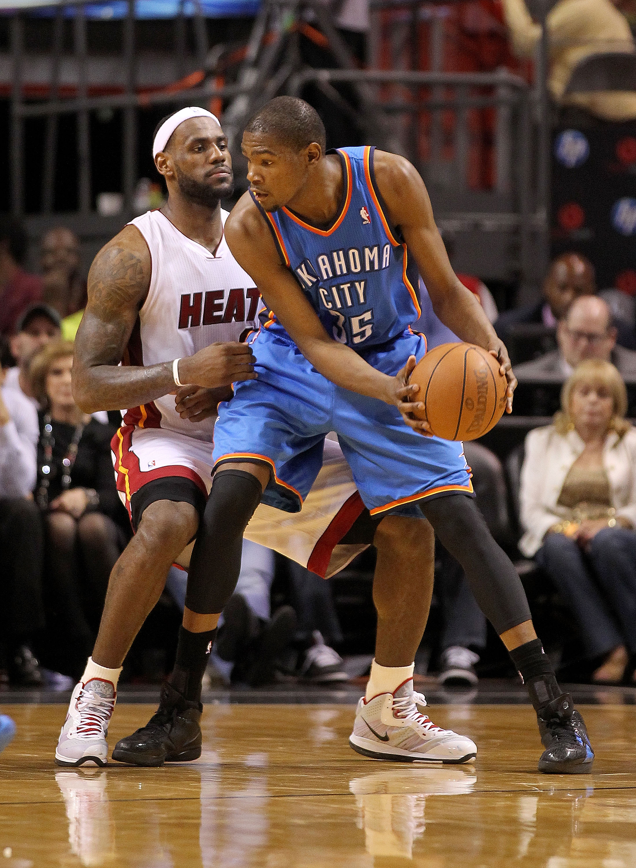 MIAMI, FL - MARCH 16:  LeBron James #6 of the Miami Heat guards Kevin Durant #35 of the Oklahoma City Thunder during a game at American Airlines Arena on March 16, 2011 in Miami, Florida. NOTE TO USER: User expressly acknowledges and agrees that, by downl