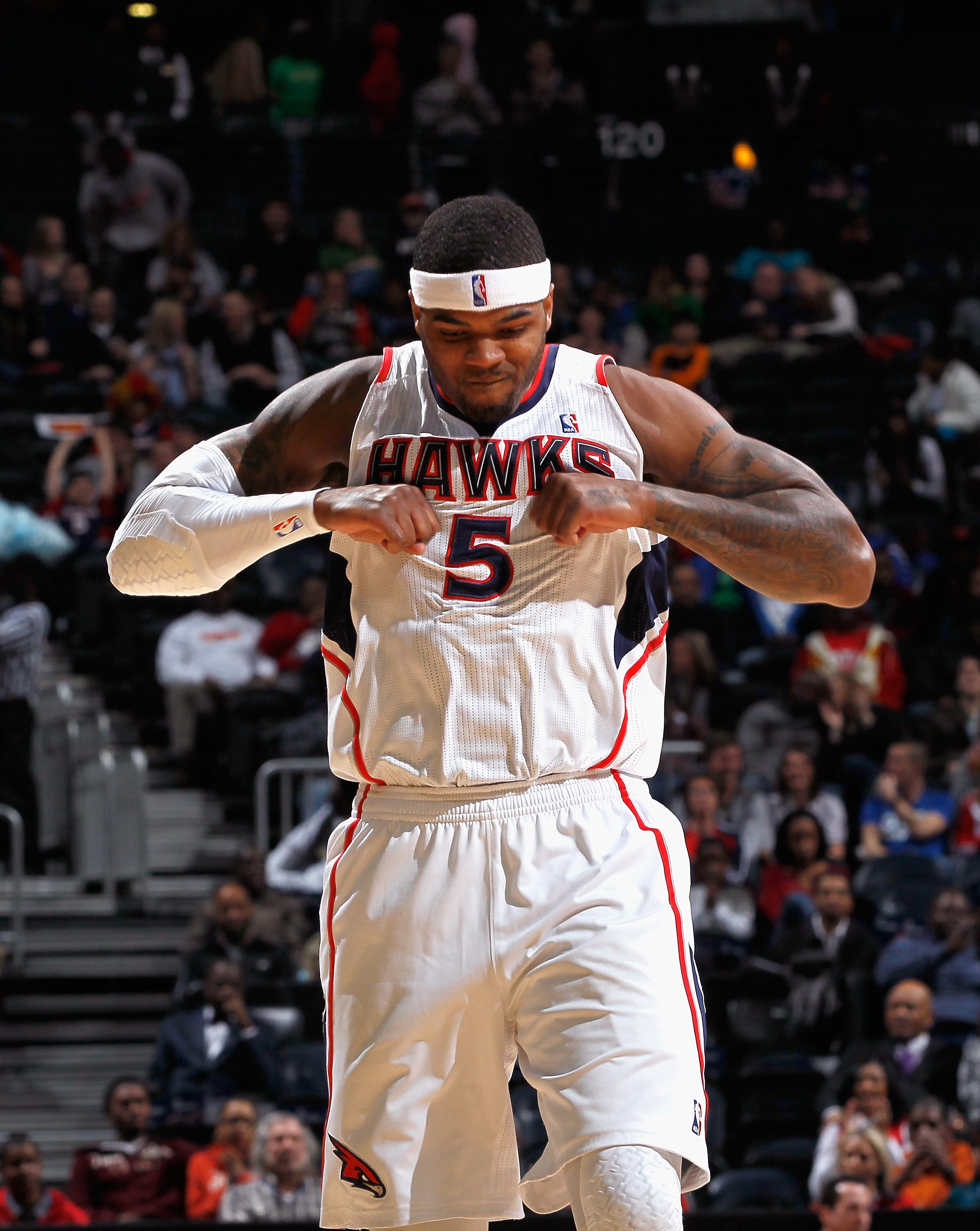 ATLANTA, GA - FEBRUARY 12:  Josh Smith #5 of the Atlanta Hawks reacts after hitting a three-point basket against the Charlotte Bobcats at Philips Arena on February 12, 2011 in Atlanta, Georgia.  NOTE TO USER: User expressly acknowledges and agrees that, b