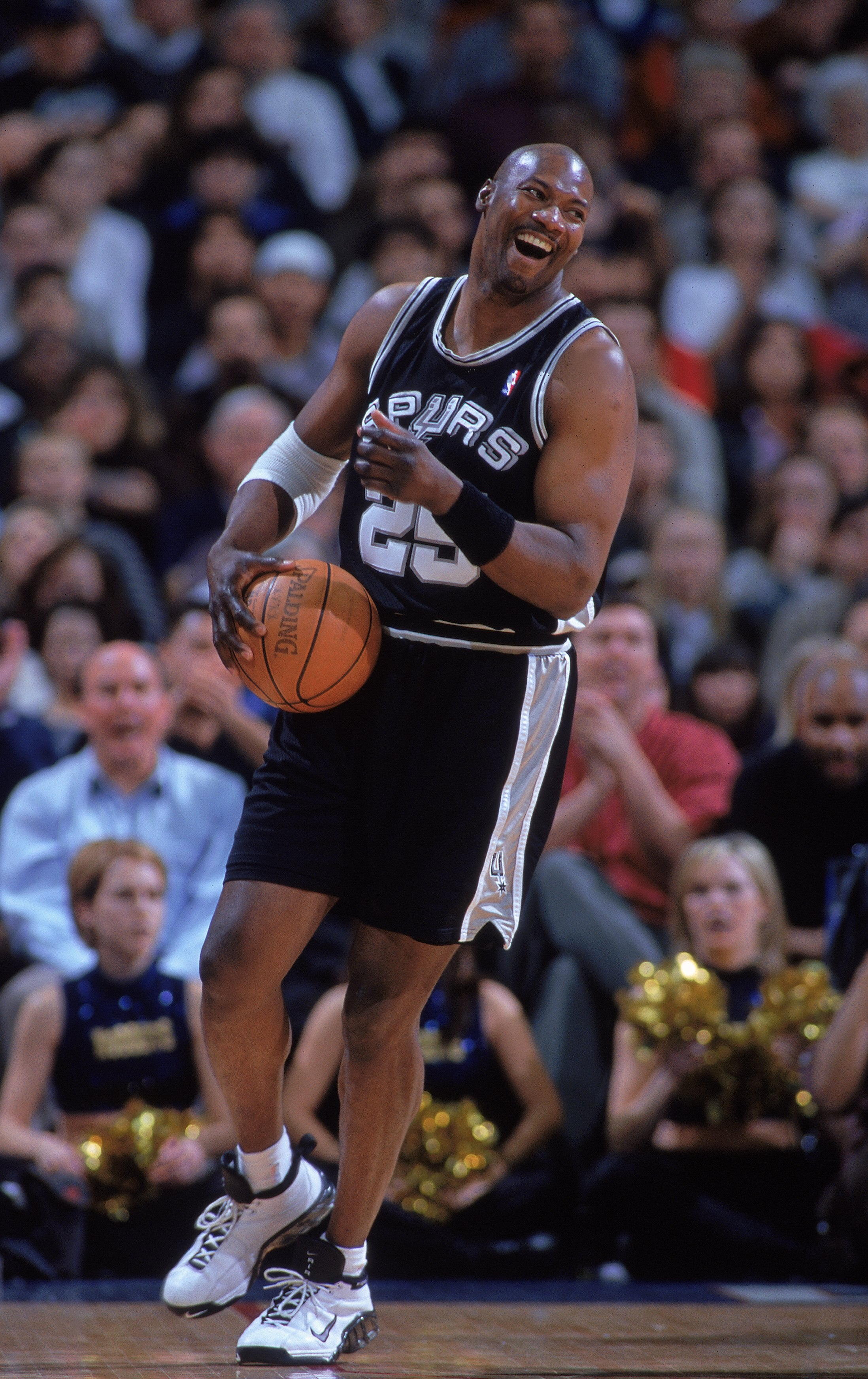 9 Feb 2000: Jerome Kersey #25 of the San Antonio Spurs laughs and moves with the ball during the game against the Denver Nuggets at the Alamodome in San Antonio, Texas. The Spurs defeated the Nuggets 106-97.