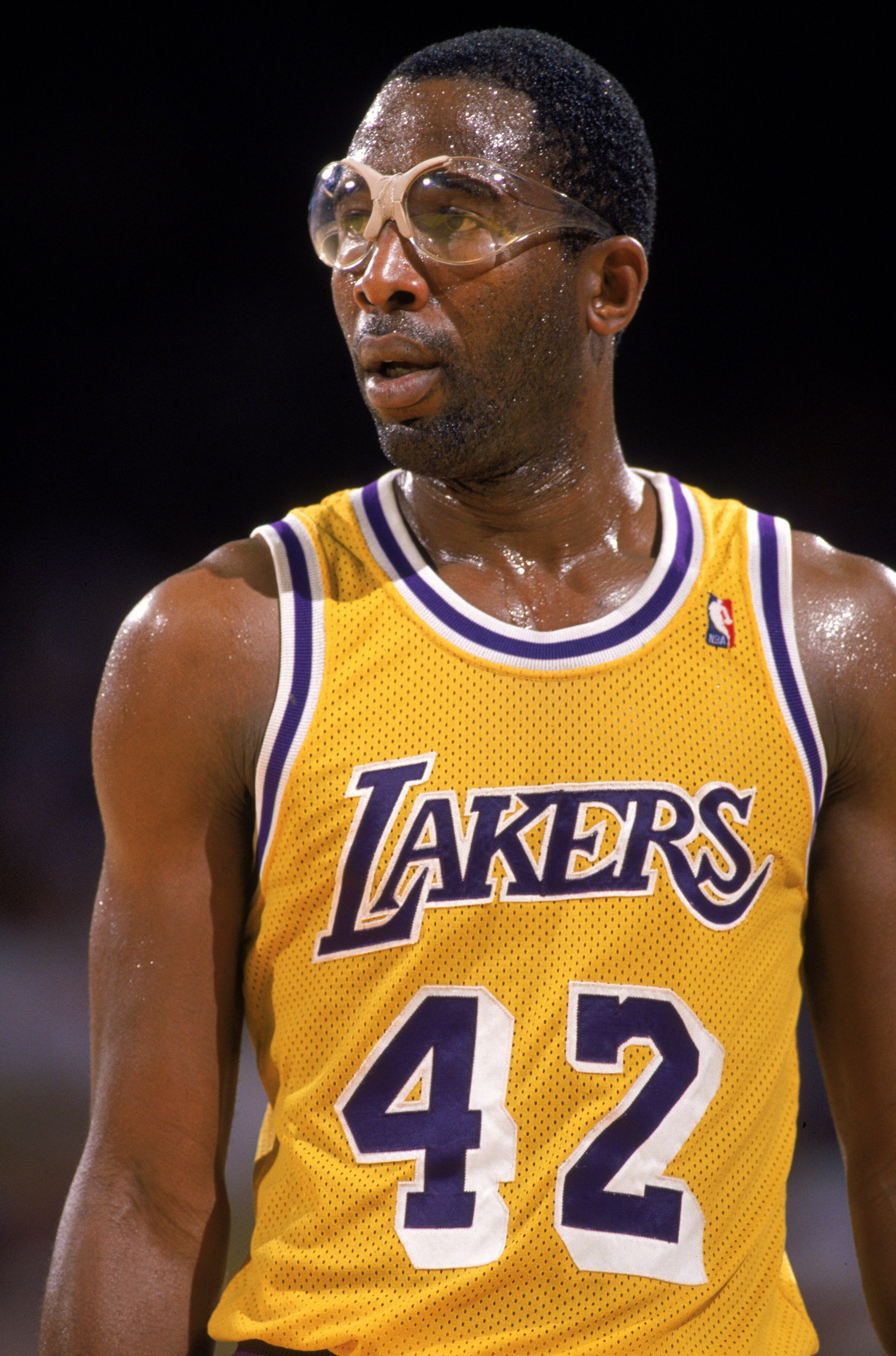 LOS ANGELES - 1989:  James Worthy #42 of the Los Angeles Lakers stands on the court during an NBA game at the Great Western Forum in Los Angeles, California in 1989. (Photo by: Mike Powell/Getty Images)