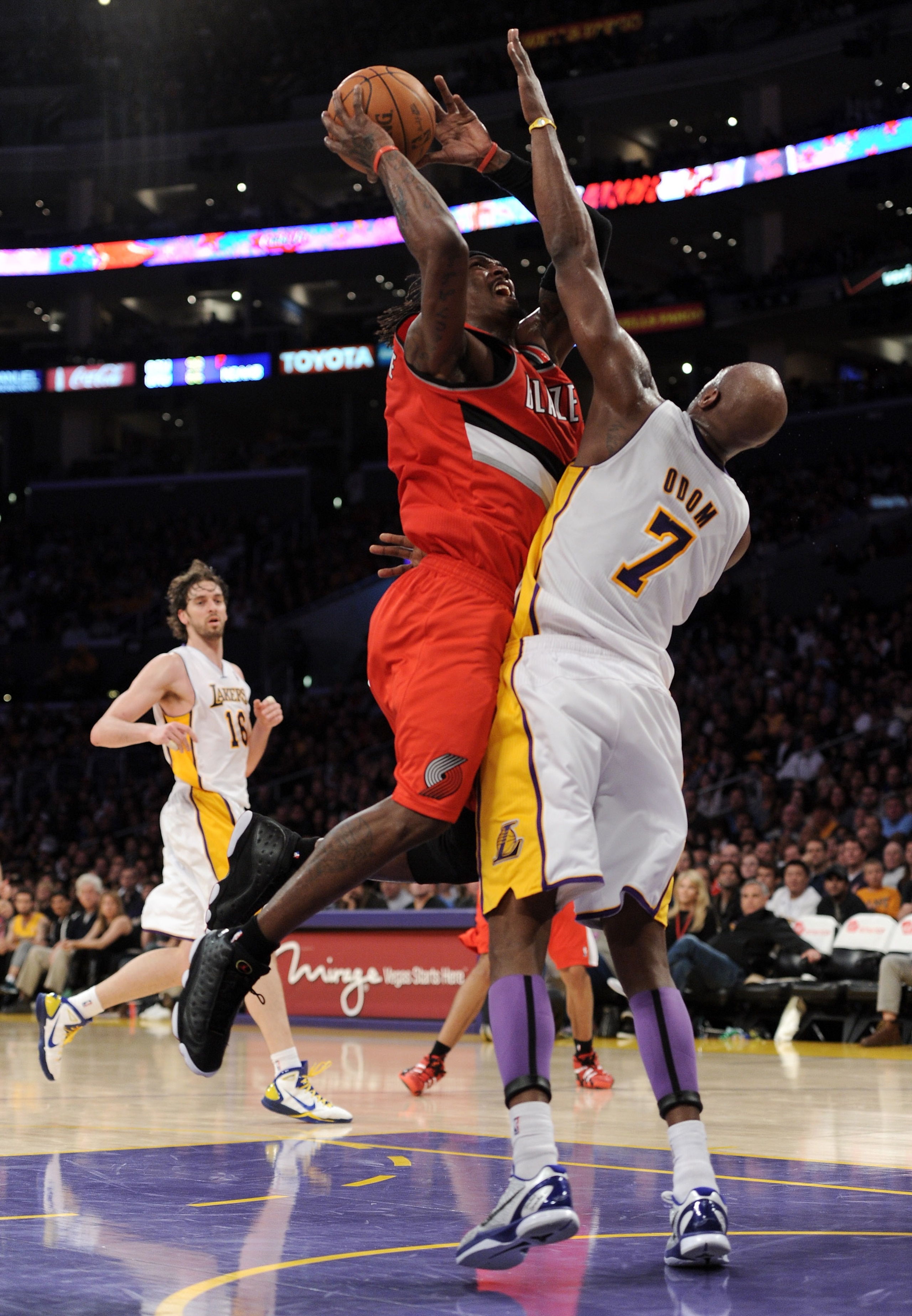 LOS ANGELES, CA - MARCH 20:  Gerald Wallace #3 of the Portland Trail Blazers attempts a shot in front of Lamar Odom #7 of the Los Angeles Lakers at the Staples Center on March 20, 2011 in Los Angeles, California.  NOTE TO USER: User expressly acknowledges