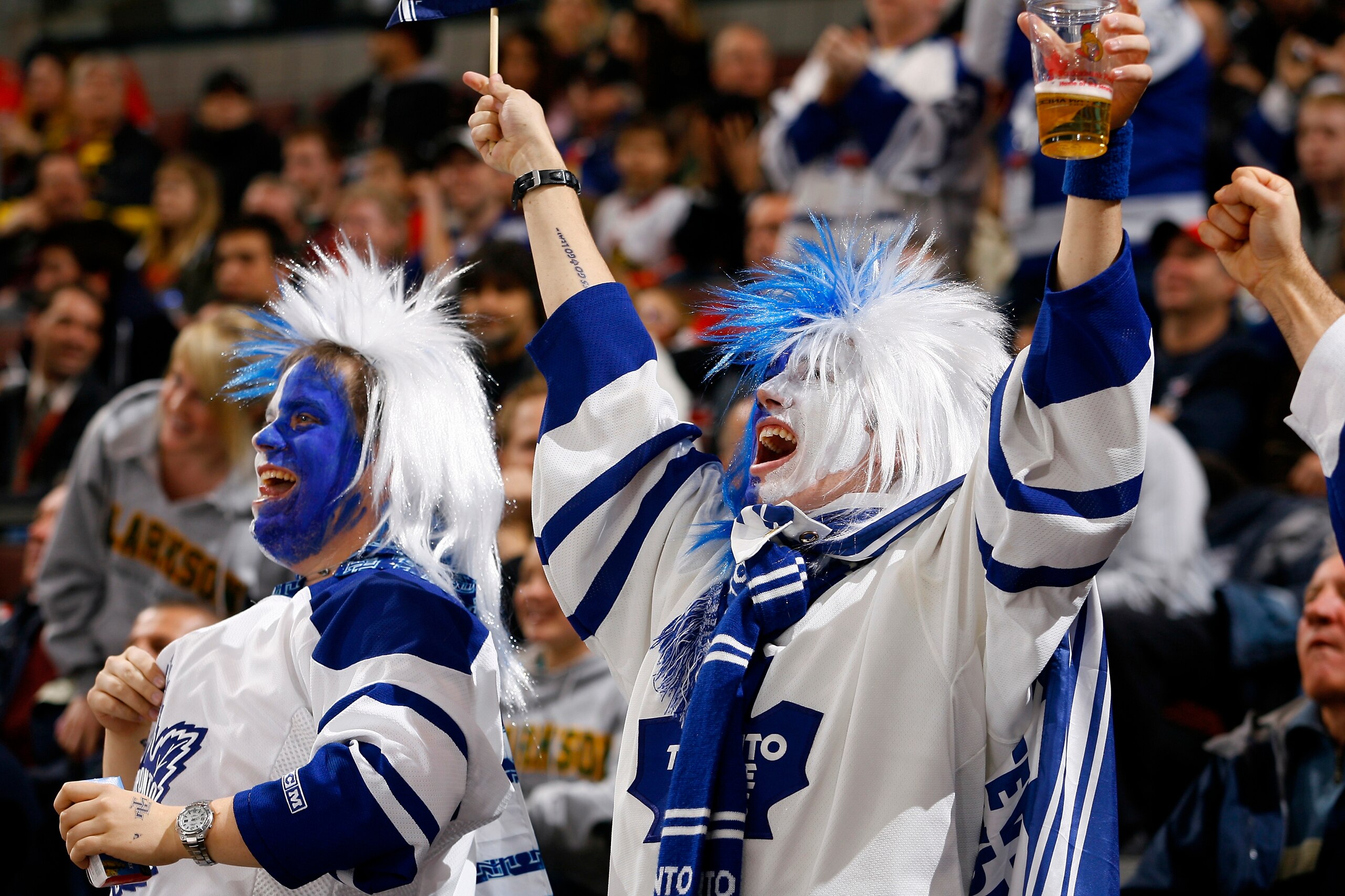 OTTAWA, ON - NOVEMBER 17: Two lively fans of the Toronto Maple Leafs celebrate a goal against the Ottawa Senators in a game at Scotiabank Place on November 17, 2009 in Ottawa, Canada. (Photo by Phillip MacCallum/Getty Images) OTTAWA, ON - NOVEMBER 17: Two lively fans of the Toronto Maple Leafs celebrate a goal against the Ottawa Senators in a game at Scotiabank Place on November 17, 2009 in Ottawa, Canada. (Photo by Phillip MacCallum/Getty Images)