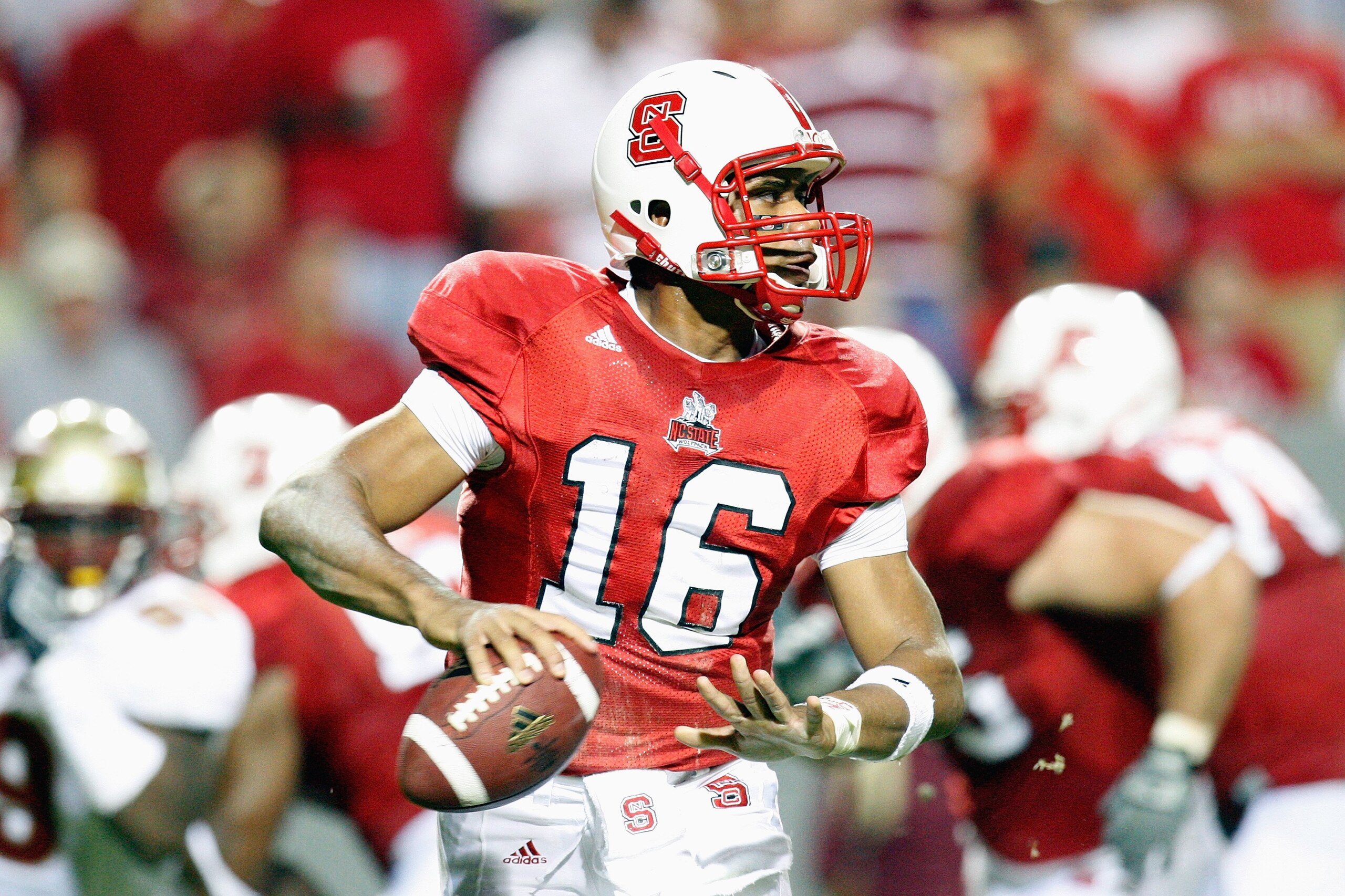 RALEIGH, NC - OCTOBER 16:  Russell Wilson #16 of the North Carolina State Wolfpack looks for a receiver during the game against the Florida State Seminoles at Carter-Finley Stadium on October 16, 2008 in Raleigh, North Carolina.  (Photo by Kevin C. Cox/Ge