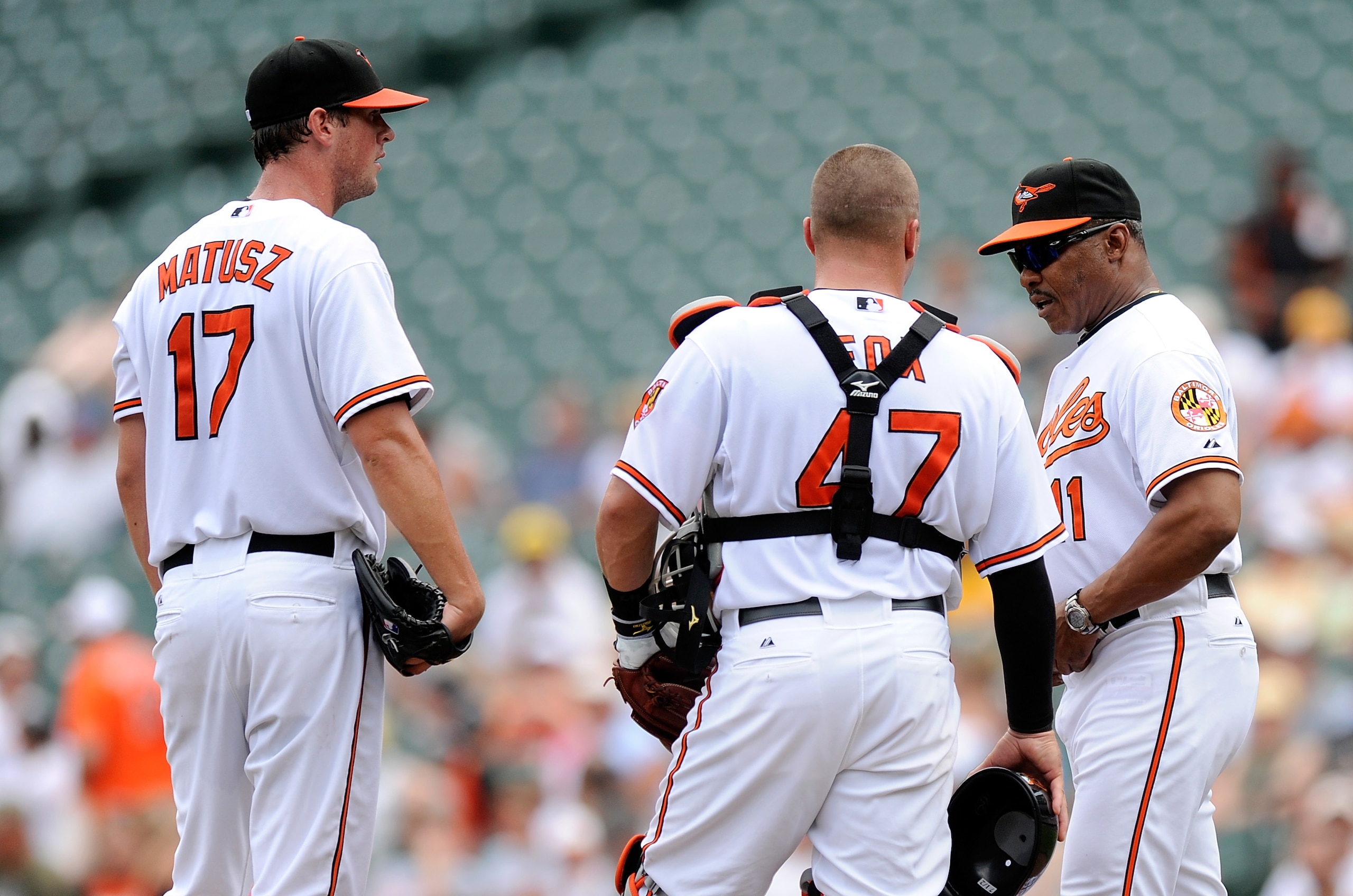 BALTIMORE - JULY 18:  Brian Matusz #17 the Baltimore Orioles is removed from the game by Interim Manager Juan Samuel in the second inning against the Toronto Blue Jays at Camden Yards on July 18, 2010 in Baltimore, Maryland.  (Photo by Greg Fiume/Getty Im