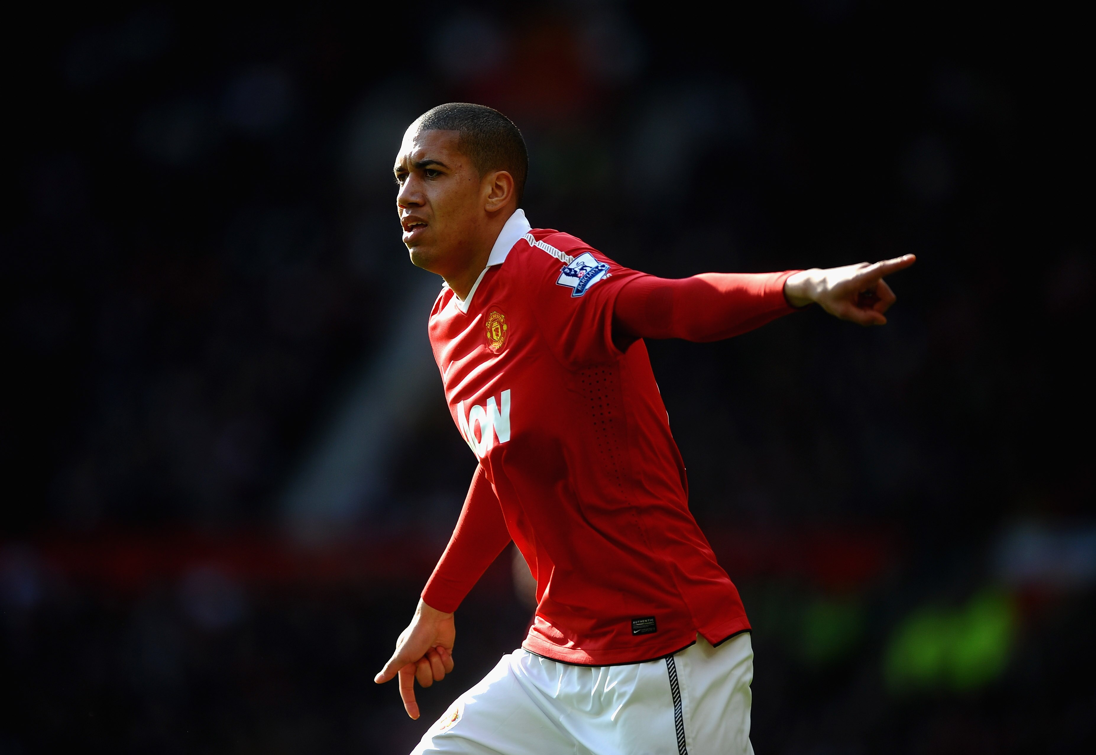 MANCHESTER, ENGLAND - MARCH 19: Chris Smalling of Manchester United looks on during the Barclays Premier League match between Manchester United and Bolton Wanderers at Old Trafford on March 19, 2011 in Manchester, England.  (Photo by Laurence Griffiths/Ge