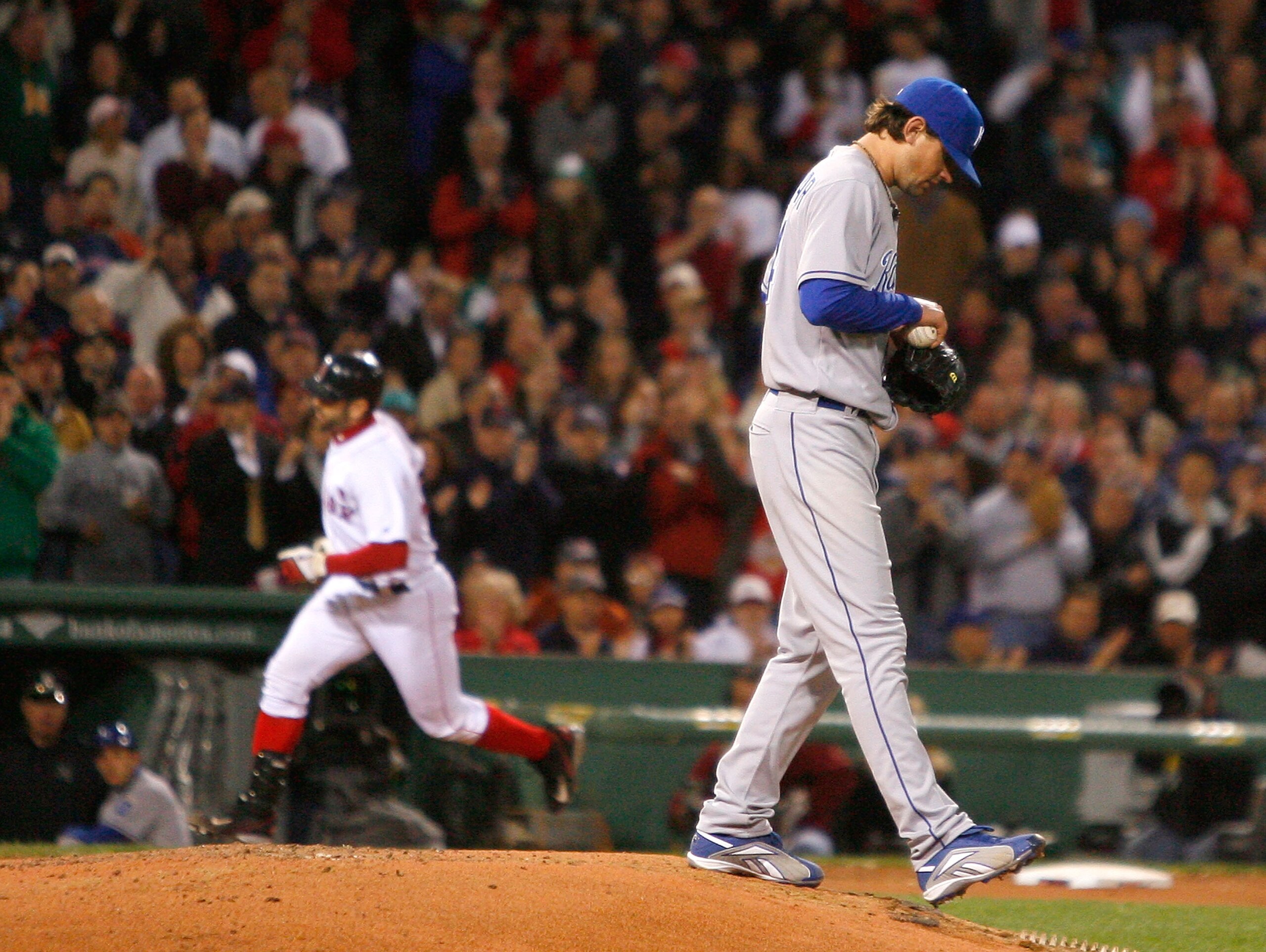 BOSTON - MAY 19:  Jason Varitek #33 of the Boston Red Sox rounds the bases after hitting a home run off of pitcher Luke Hochevar #44 of  the Kansas City Royals at Fenway Park on May 19, 2008 in Boston, Massachusetts.  The Red sox won the game 7-0 with pit