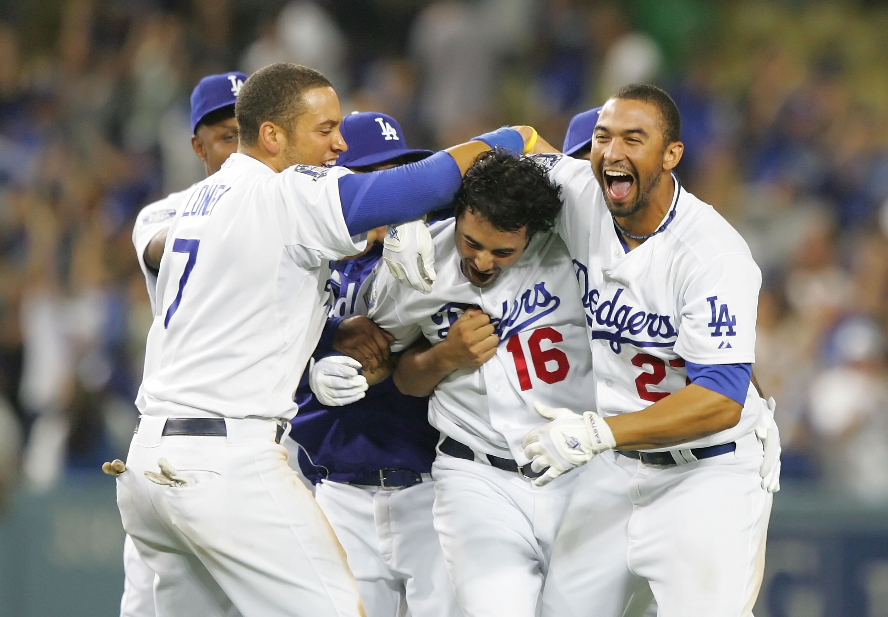 LOS ANGELES, CA - AUGUST 12:  Andre Ethier #16 of the Los Angeles Dodgers celebrates with his teammates after hitting the game-winning run in the ninth inning against the Philadelphia Phillies at Dodger Stadium August 12, 2008 in Los Angeles, California. 