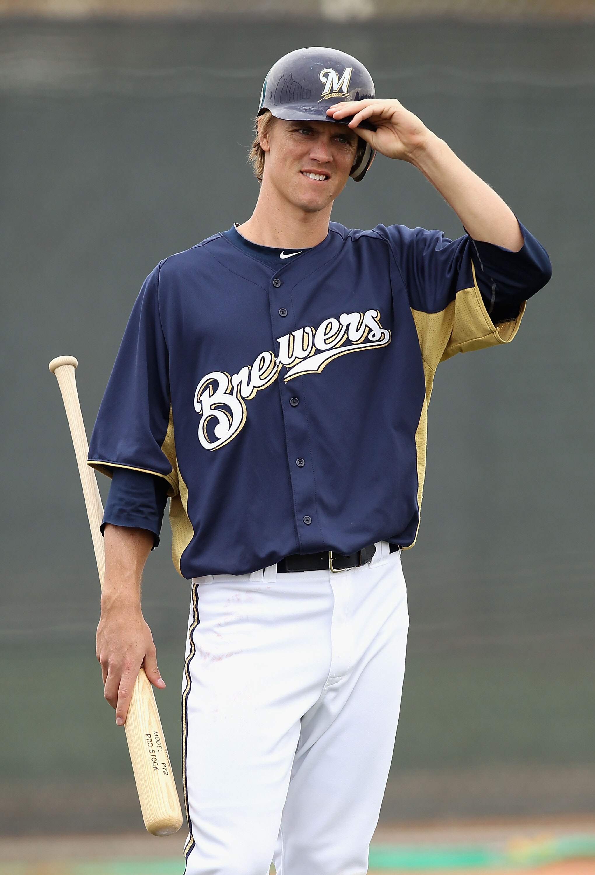 PHOENIX, AZ - FEBRUARY 18:  Zack Greinke #13 of the Milwaukee Brewers participates in bunting drills during a MLB spring training practice at Maryvale Baseball Park on February 18, 2011 in Phoenix, Arizona.  (Photo by Christian Petersen/Getty Images)