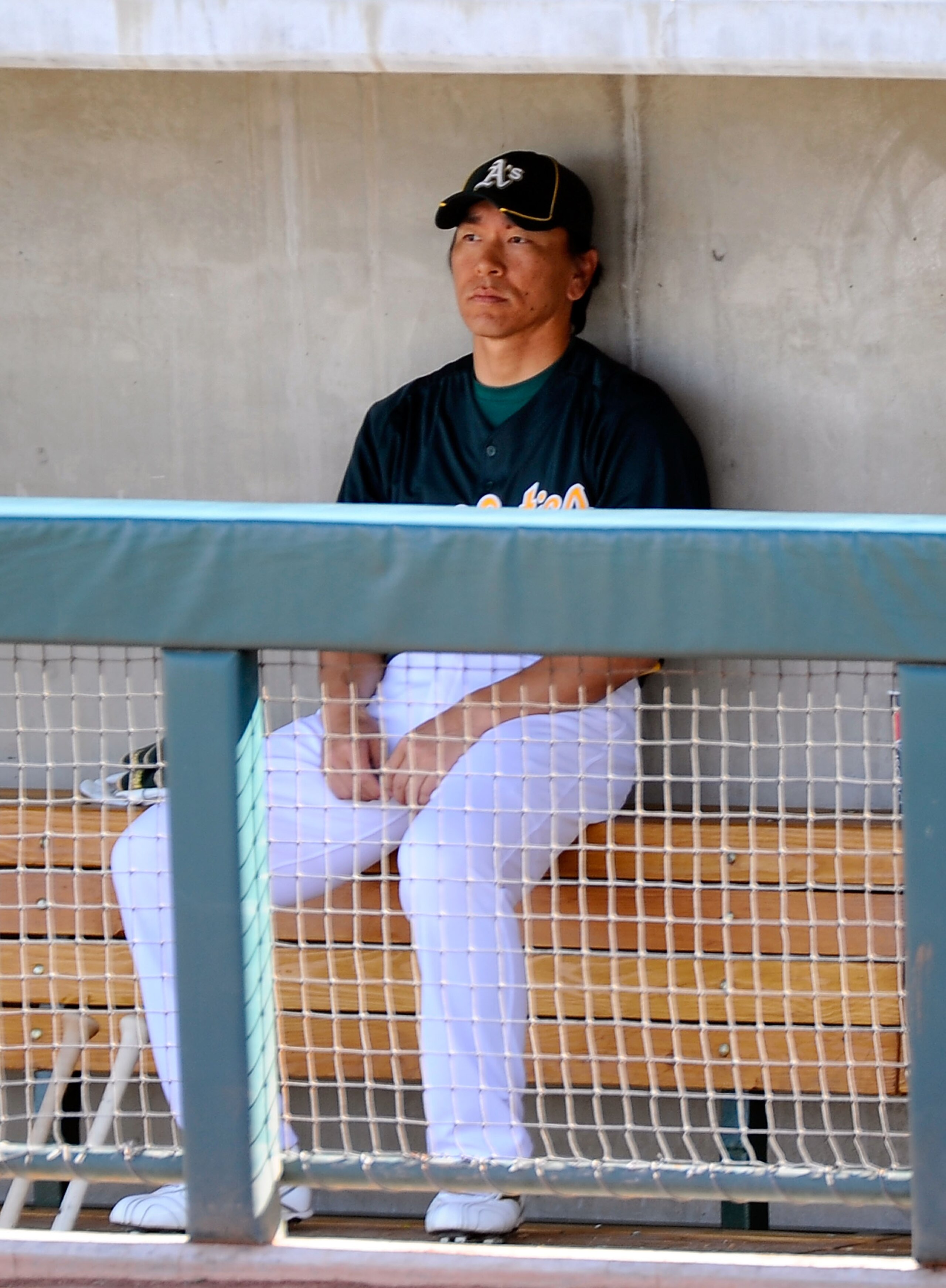 PHOENIX, AZ - MARCH 15:  Hideki Matsui #55 of the Oakland Athletics sits in the dug out against the Chicago Cubs during the spring training baseball game at Phoenix Municipal Stadium on March 15, 2011 in Phoenix, Arizona.  (Photo by Kevork Djansezian/Gett