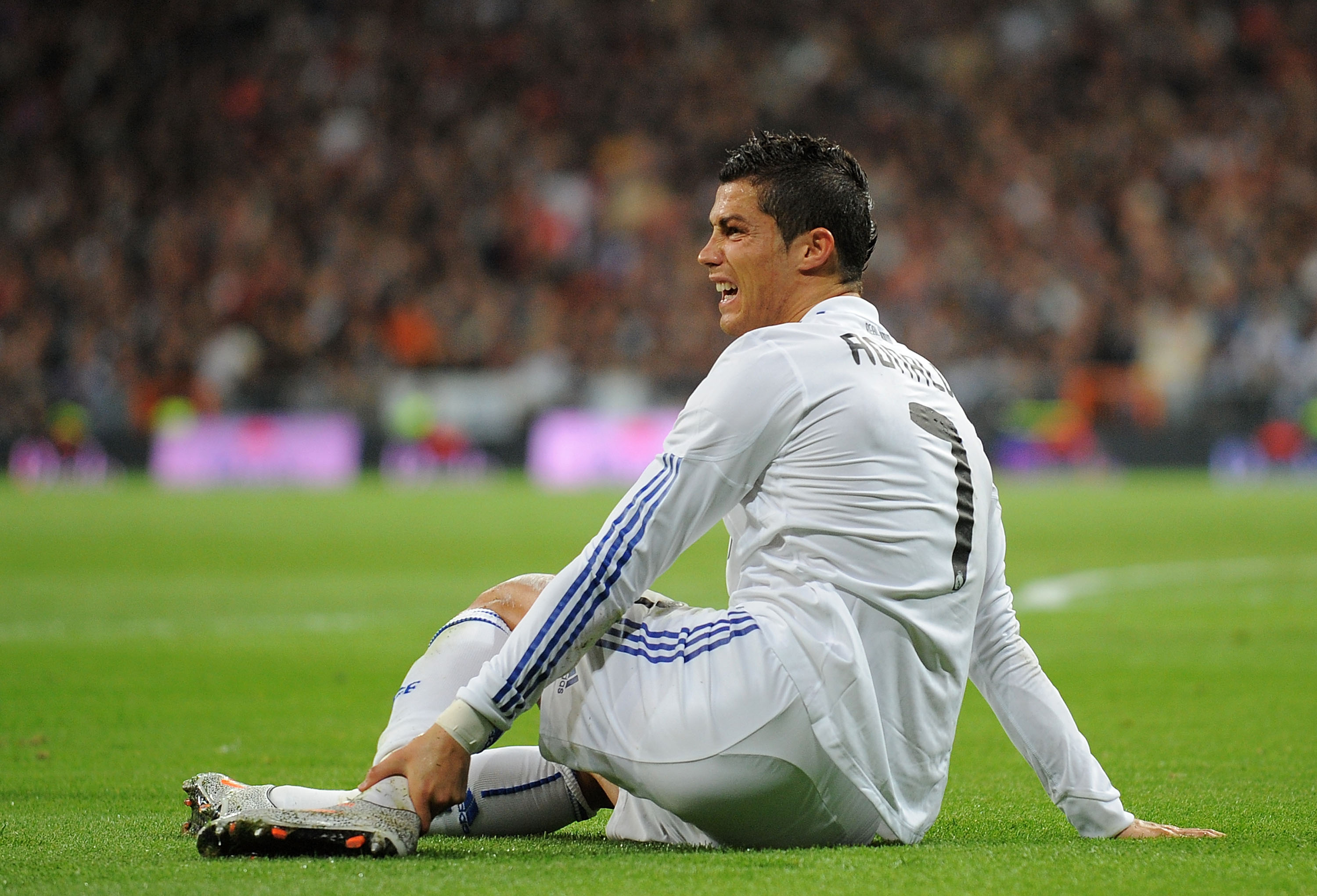 MADRID, SPAIN - NOVEMBER 07: Cristiano Ronaldo  of Real Madrid reacts after being fouled during the La Liga match between Real Madrid and Atletico Madrid at Estadio Santiago Bernabeu on November 7, 2010 in Madrid, Spain.  (Photo by Denis Doyle/Getty Image