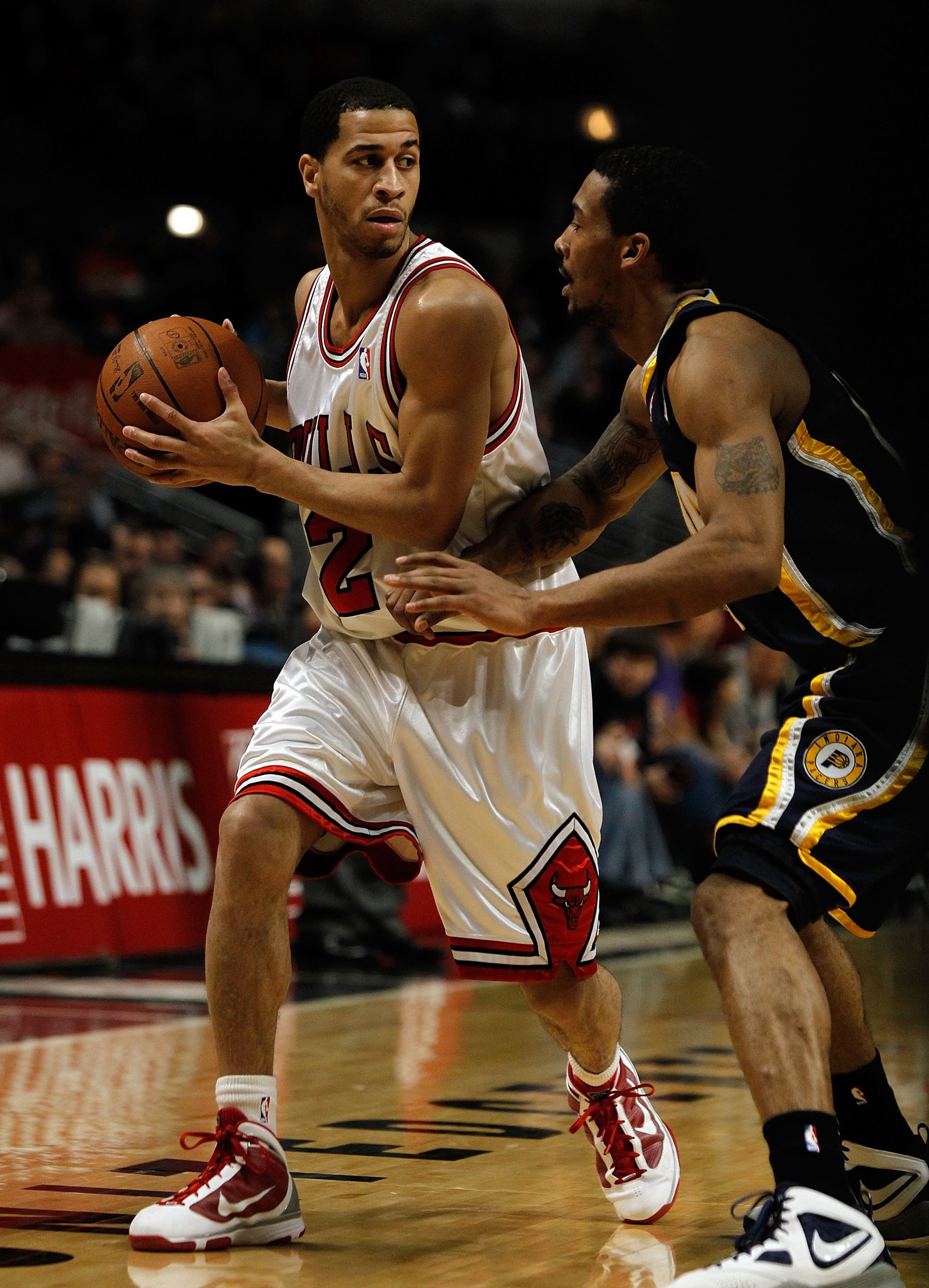 CHICAGO - FEBRUARY 24: Jannero Pargo #2 of the Chicago Bulls looks to pass against Luther Head #13 of the Indiana Pacers at the United Center on February 24, 2010 in Chicago, Illinois. The Bulls defeated the Pacers 120-110. NOTE TO USER: User expressly ac CHICAGO - FEBRUARY 24: Jannero Pargo #2 of the Chicago Bulls looks to pass against Luther Head #13 of the Indiana Pacers at the United Center on February 24, 2010 in Chicago, Illinois. The Bulls defeated the Pacers 120-110. NOTE TO USER: User expressly ac