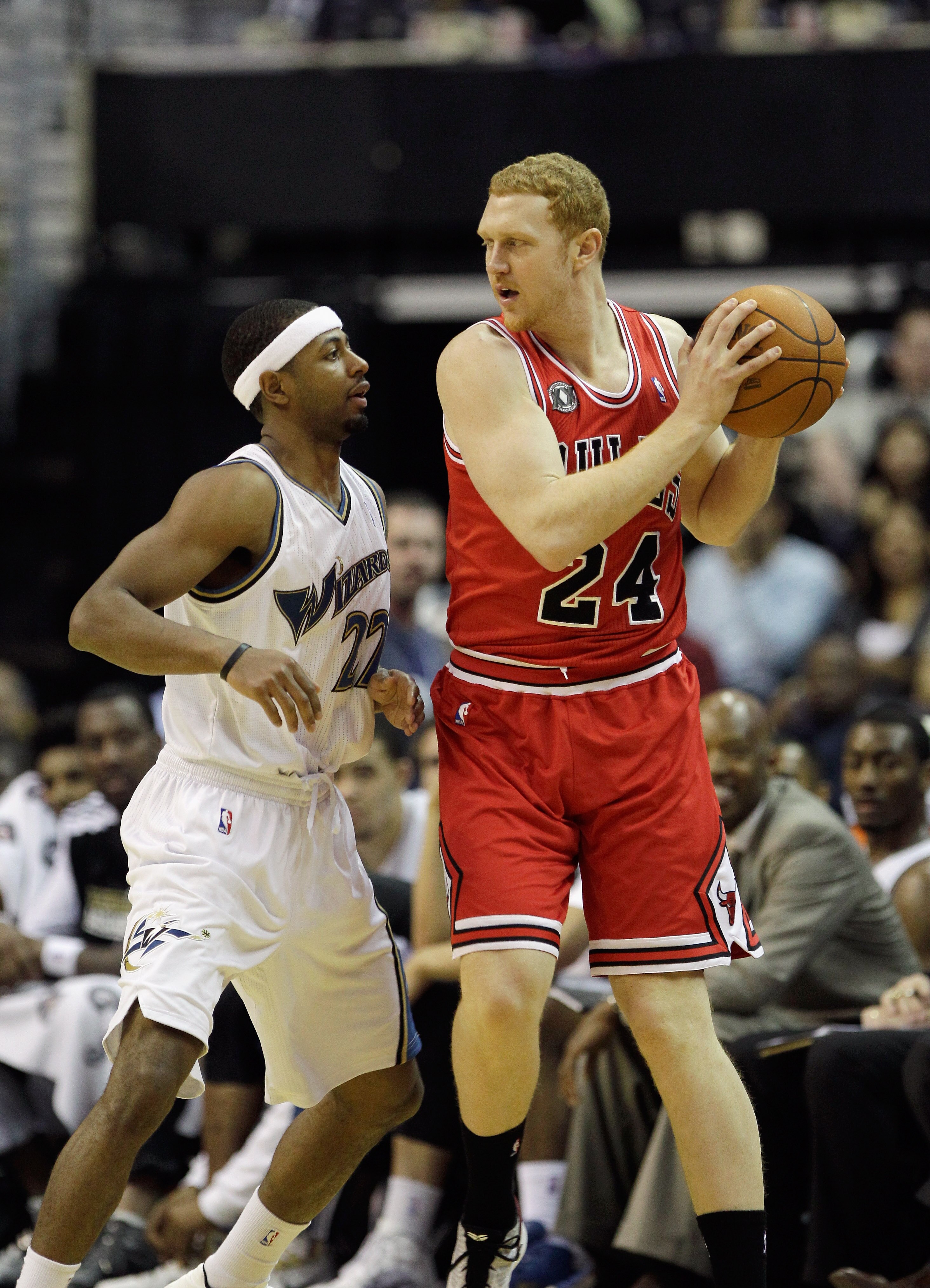 WASHINGTON, DC - FEBRUARY 28: Brian Scalabrine #24 of the Chicago Bulls and Mustafa Shakur #22 of the Washington Wizards at the Verizon Center in Washington on February 28, 2011 in Washington, DC. NOTE TO USER: User expressly acknowledges and agrees that,