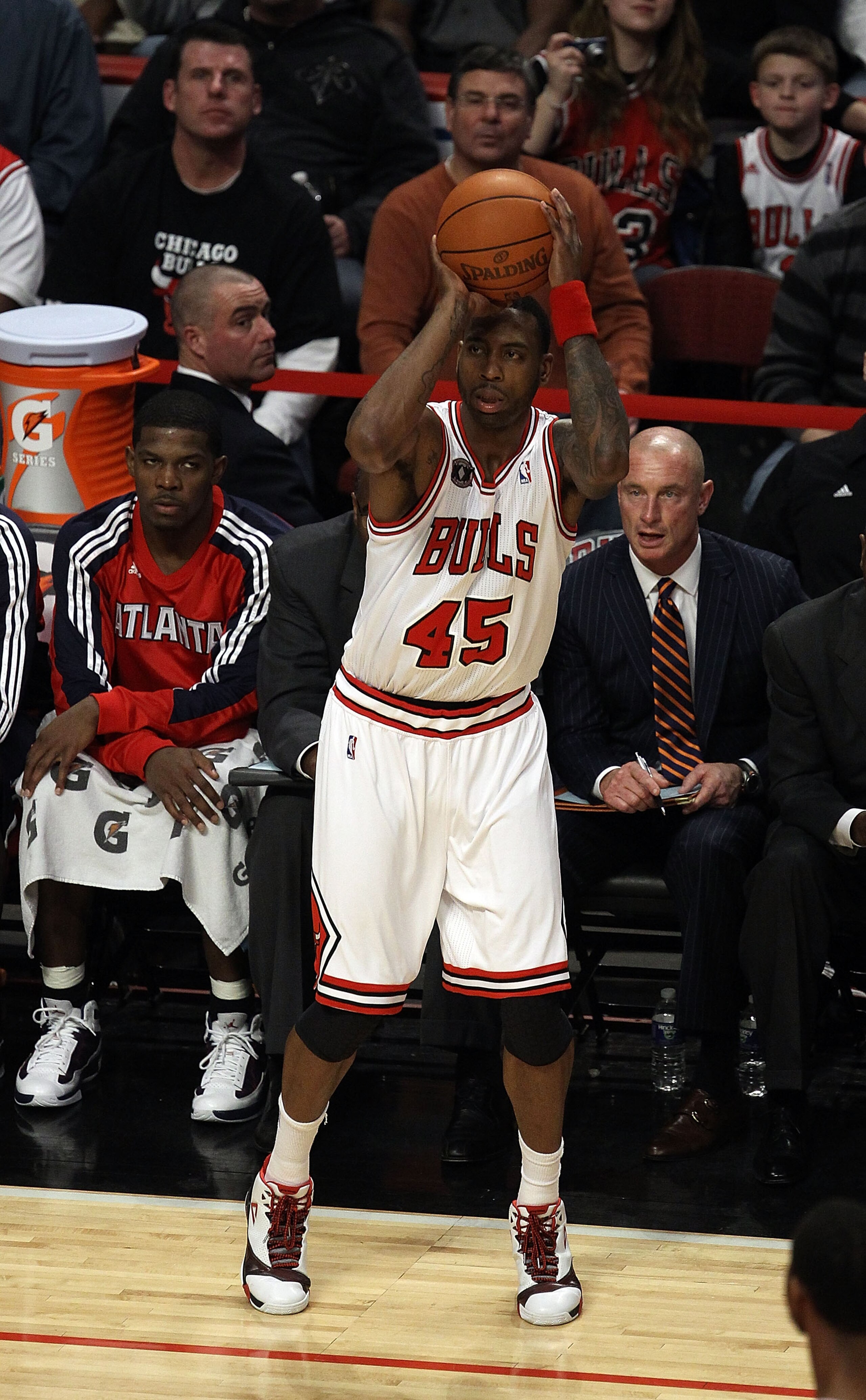 CHICAGO, IL - MARCH 11: Rasual Butler #45 of the Chicago Bulls gets his first playing time and basket as a member of the Bulls against the Atlanta Hawks at the United Center on March 11, 2011 in Chicago, Illinois. The Bulls defeated the Hawks 94-76. NOTE CHICAGO, IL - MARCH 11: Rasual Butler #45 of the Chicago Bulls gets his first playing time and basket as a member of the Bulls against the Atlanta Hawks at the United Center on March 11, 2011 in Chicago, Illinois. The Bulls defeated the Hawks 94-76. NOTE