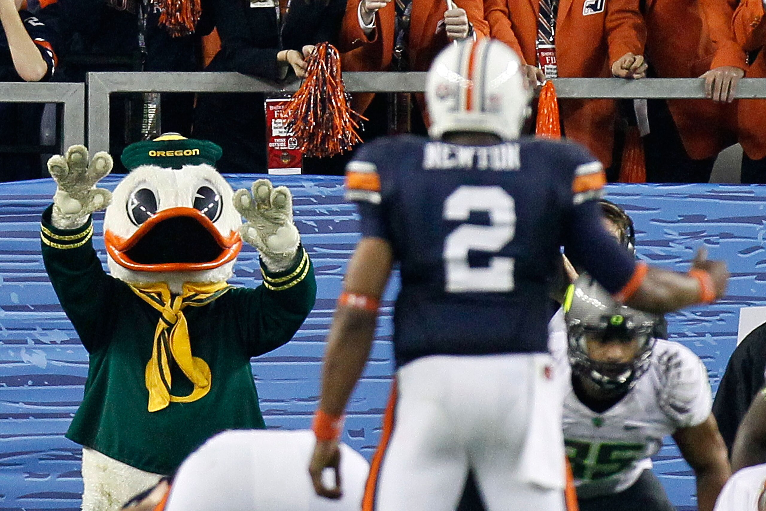 GLENDALE, AZ - JANUARY 10: The Oregon Duck mocks Cameron Newton #2 of the Auburn Tigers during the Tostitos BCS National Championship Game at University of Phoenix Stadium on January 10, 2011 in Glendale, Arizona. (Photo by Kevin C. Cox/Getty Images) GLENDALE, AZ - JANUARY 10: The Oregon Duck mocks Cameron Newton #2 of the Auburn Tigers during the Tostitos BCS National Championship Game at University of Phoenix Stadium on January 10, 2011 in Glendale, Arizona. (Photo by Kevin C. Cox/Getty Images)
