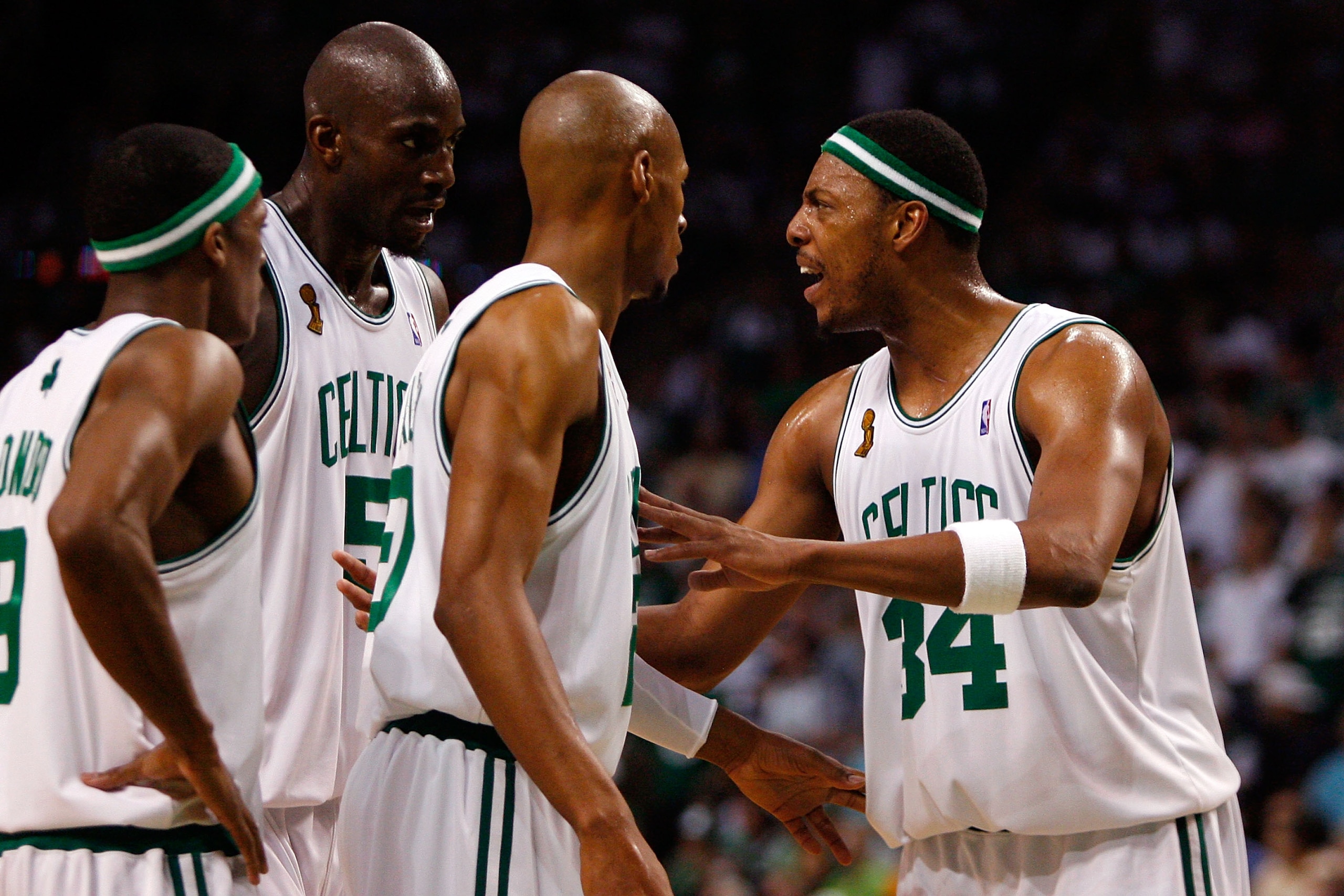 BOSTON - JUNE 17: (L-R) Rajon Rondo #9, Kevin Garnett #5 and Ray Allen #20 listen to teammate Paul Pierce #34 of the Boston Celtics in the third quarter of Game Six of the 2008 NBA Finals against the Los Angeles Lakers on June 17, 2008 at TD Banknorth Ga BOSTON - JUNE 17: (L-R) Rajon Rondo #9, Kevin Garnett #5 and Ray Allen #20 listen to teammate Paul Pierce #34 of the Boston Celtics in the third quarter of Game Six of the 2008 NBA Finals against the Los Angeles Lakers on June 17, 2008 at TD Banknorth Ga