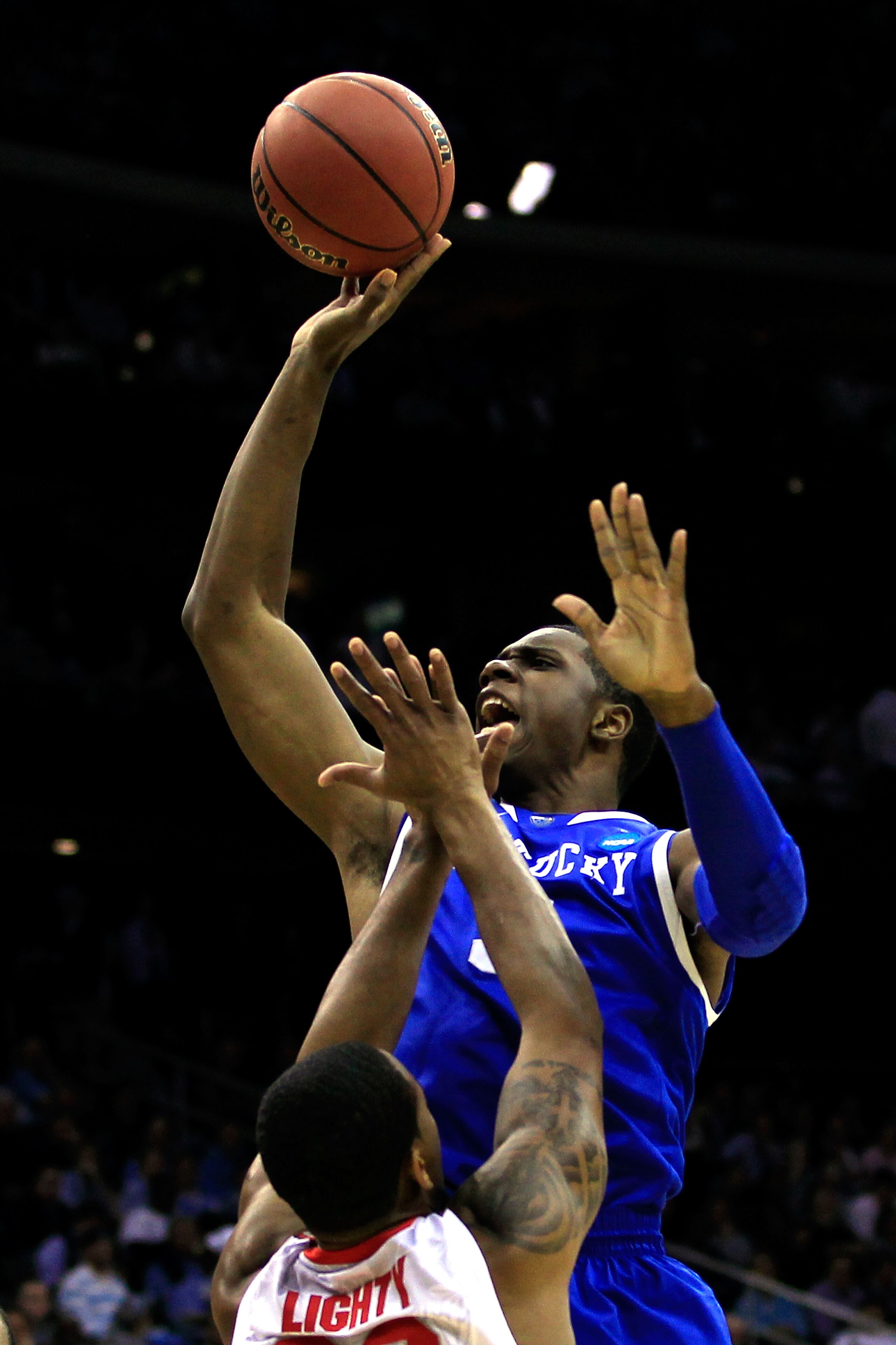 NEWARK, NJ - MARCH 25: Terrence Jones #3 of the Kentucky Wildcats takes a shot against David Lighty #23 of the Ohio State Buckeyes during the first half of the east regional semifinal of the 2011 NCAA Men's Basketball Tournament at the Prudential Center NEWARK, NJ - MARCH 25: Terrence Jones #3 of the Kentucky Wildcats takes a shot against David Lighty #23 of the Ohio State Buckeyes during the first half of the east regional semifinal of the 2011 NCAA Men's Basketball Tournament at the Prudential Center