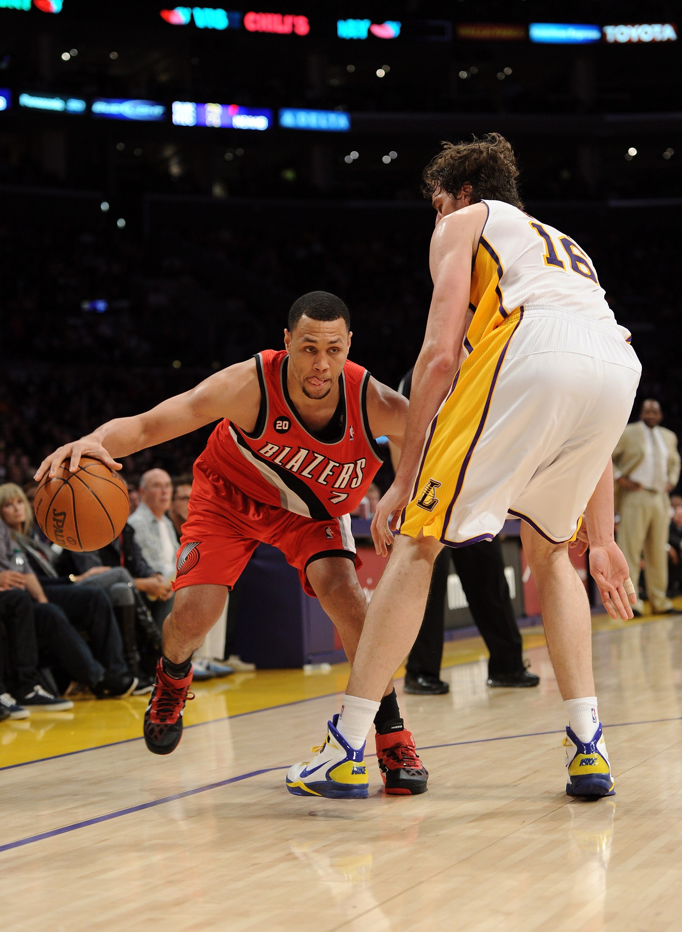 LOS ANGELES, CA - MARCH 20:  Brandon Roy #7 of the Portland Trail Blazers dribbles as he is defended by Pau Gasol #16 of the Los Angeles Lakers at the Staples Center on March 20, 2011 in Los Angeles, California.  NOTE TO USER: User expressly acknowledges