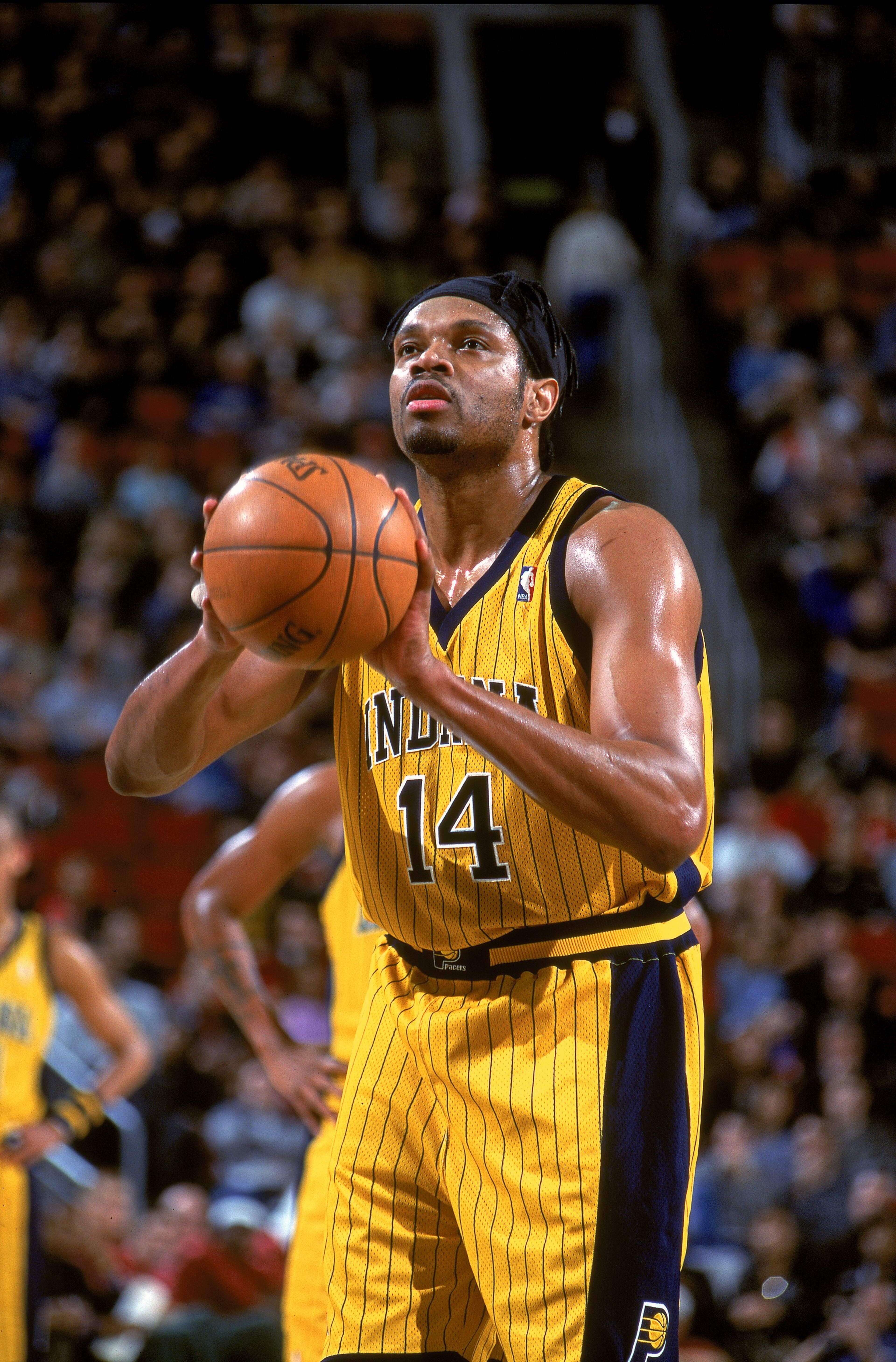 3 Jan 2001:  Sam Perkins #14 of the Indiana Pacers makes a free throw during the game against the Seattle SuperSonics at the Key Arena in Seattle, Washington.  The Pacers defeated the SuperSonics 91-83.   NOTE TO USER: It is expressly understood that the