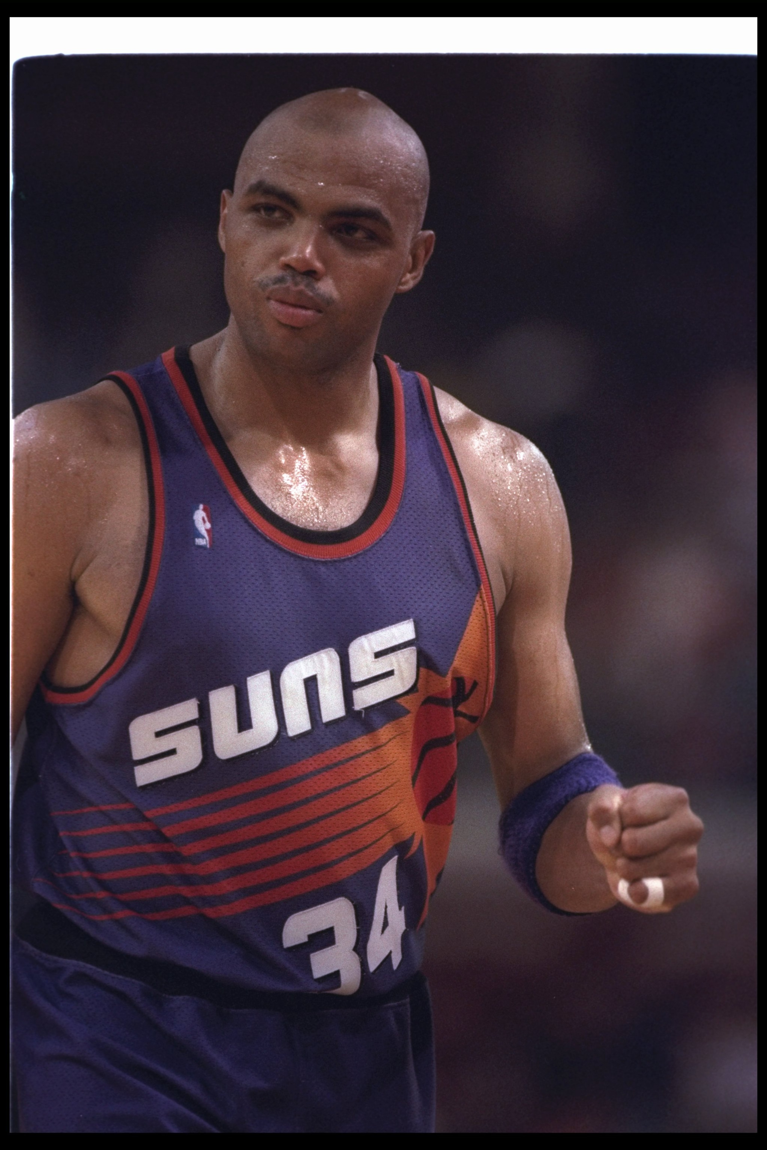 13 Jun 1993:  Forward Charles Barkley of the Phoenix Suns looks on during a game against the Chicago Bulls at the United Center in Chicago, Illinois.  The Suns won the game, 129-121. Mandatory Credit: Jonathan Daniel  /Allsport Mandatory Credit: Jonathan