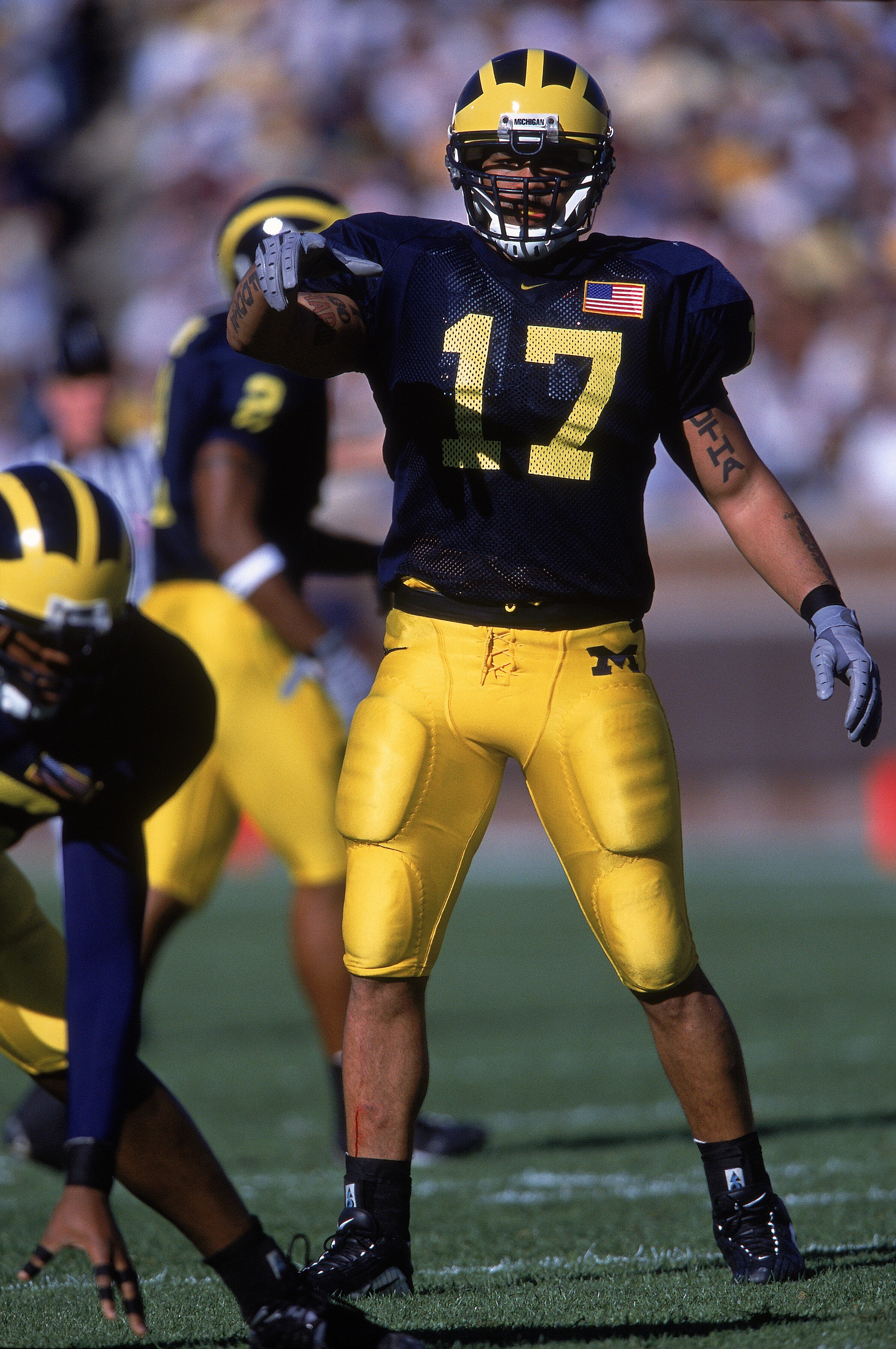 29 Sep 2001:  Larry Foote #17 of the Michigan Wolverines directs his team during the game against the Illinois Fighting Illini at the Michigan Stadium in Ann Arbor, Michigan.  The Wolverines defeated the Fighting Illini 45-20.Mandatory Credit: Tom Pidgeon