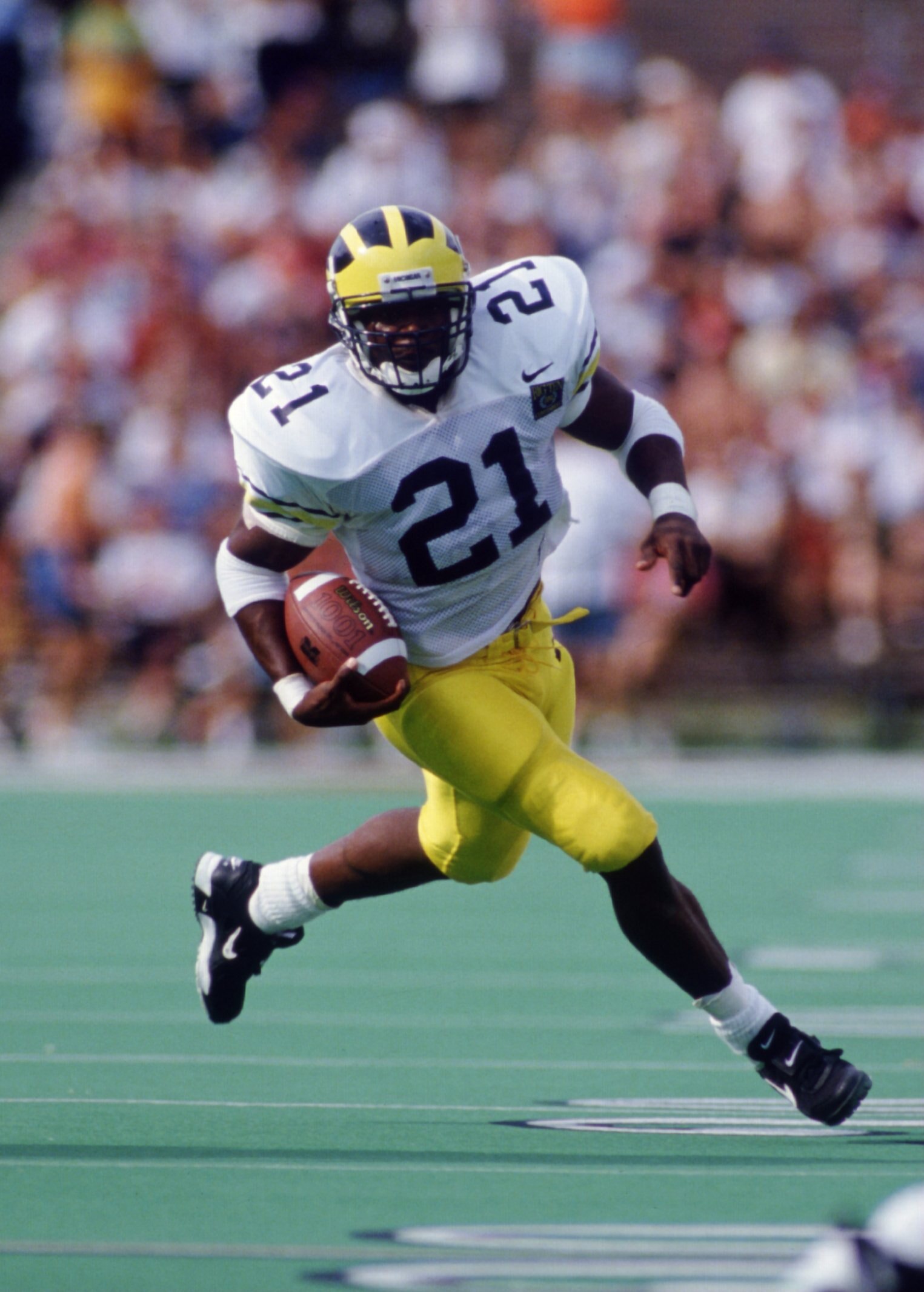 2 Sep 1995: Running back Tim Biakabutuka of the Michigan Wolverines carries the football during the Wolverines 38-14 victory over the Illinois Fighting Illini at Memorial Stadium in Champaign, Illinois.