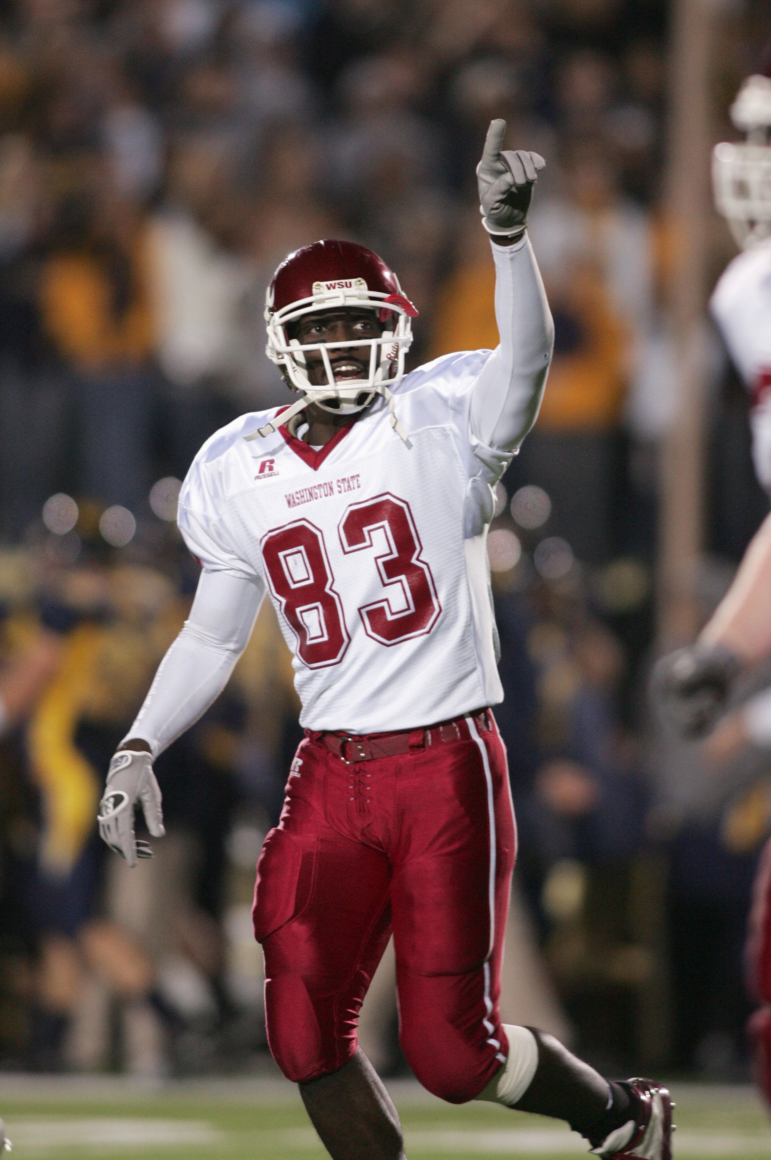 BERKELEY, CA - OCTOBER 22: Jason Hill #83 of the Washington State Cougars celebrates in the endzone against the California Golden Bears on October 22, 2005 at Memorial Stadium in Berkeley, California. The Golden Bears won the game 42-38. (Photo by Jonatha