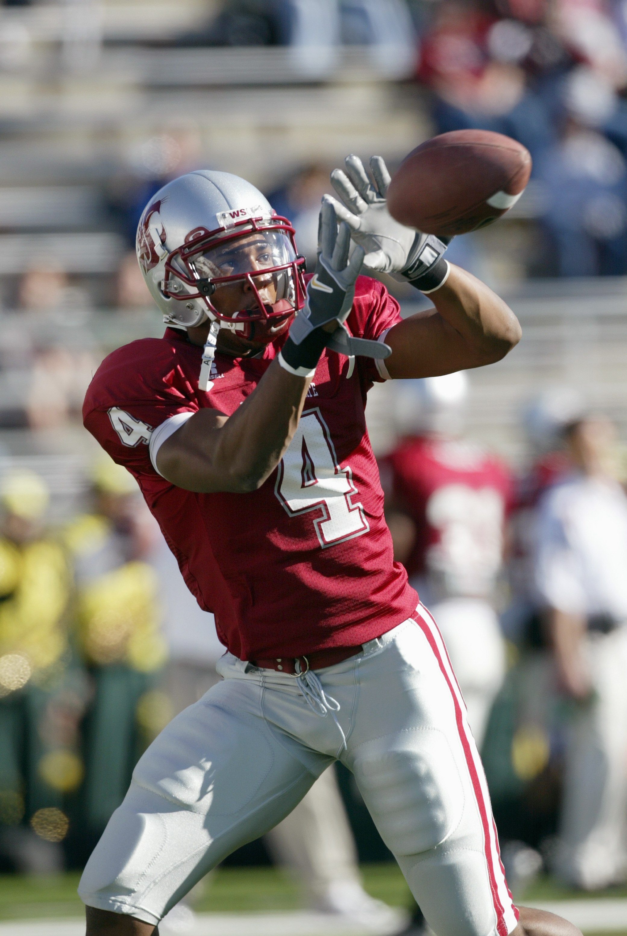 PULLMAN, WA - OCTOBER 21:  Wide receiver Brandon Gibson #4 of the Washington State Cougars catches a pass during warmups against the Oregon Ducks on October 21, 2006 at Martin Stadium in Pullman, Washington. Washington State won 34-23. (Photo by Otto Greu