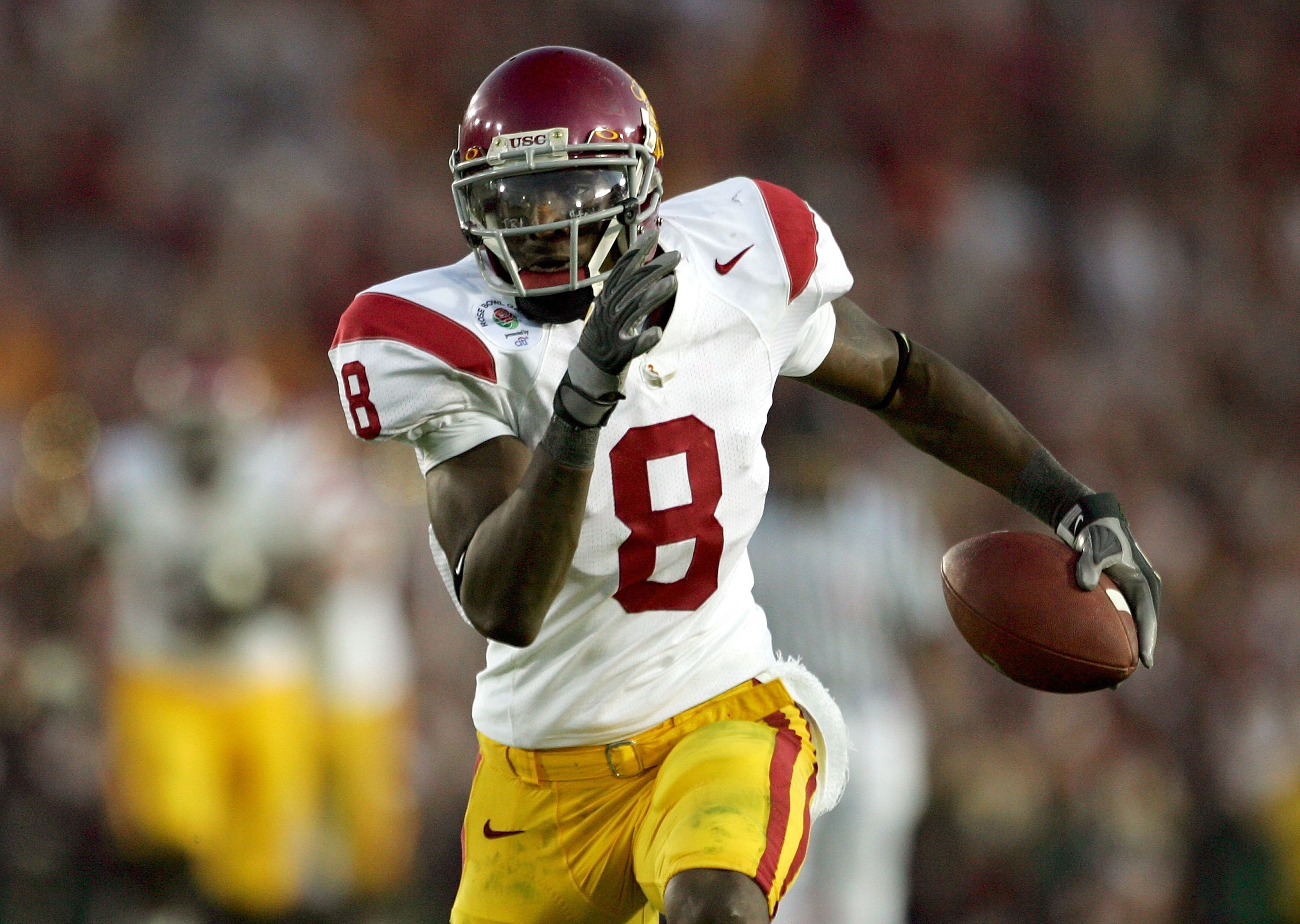 PASADENA, CA - JANUARY 01:  Dwayne Jarrett #8 of the USC Trojans runs in for a touchdown after catching the ball in the fourth quarter of the game with the Michigan Wolverines on January 1, 2007 at the Rose Bowl in Pasadena, California.  USC won the game