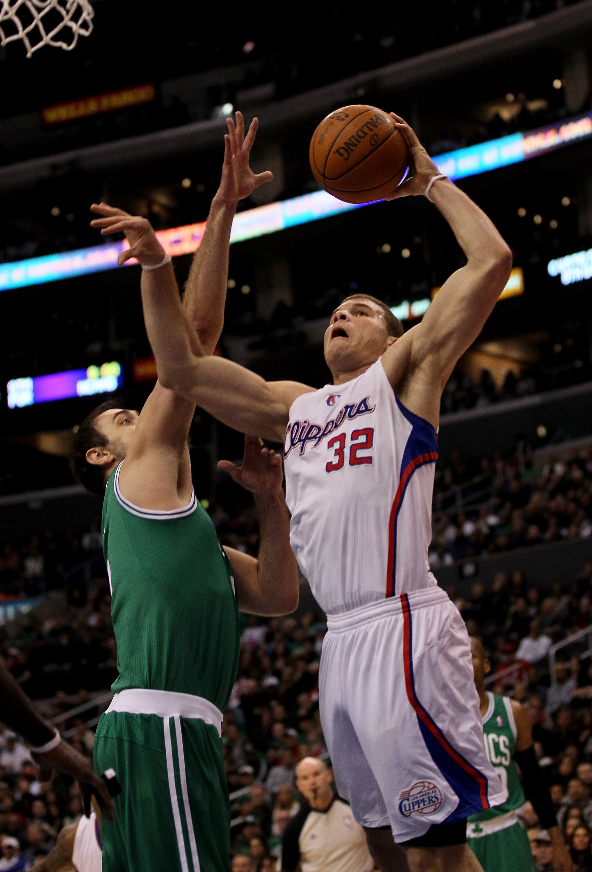 LOS ANGELES, CA - FEBRUARY 26:  Blake Griffin #32 of the Los Angeles Clippers goes for a dunk over Nenad Krstic #4 of the Boston Celtics at Staples Center on February 26, 2011  in Los Angeles, California. The Celtics won 99-92.  NOTE TO USER: User express