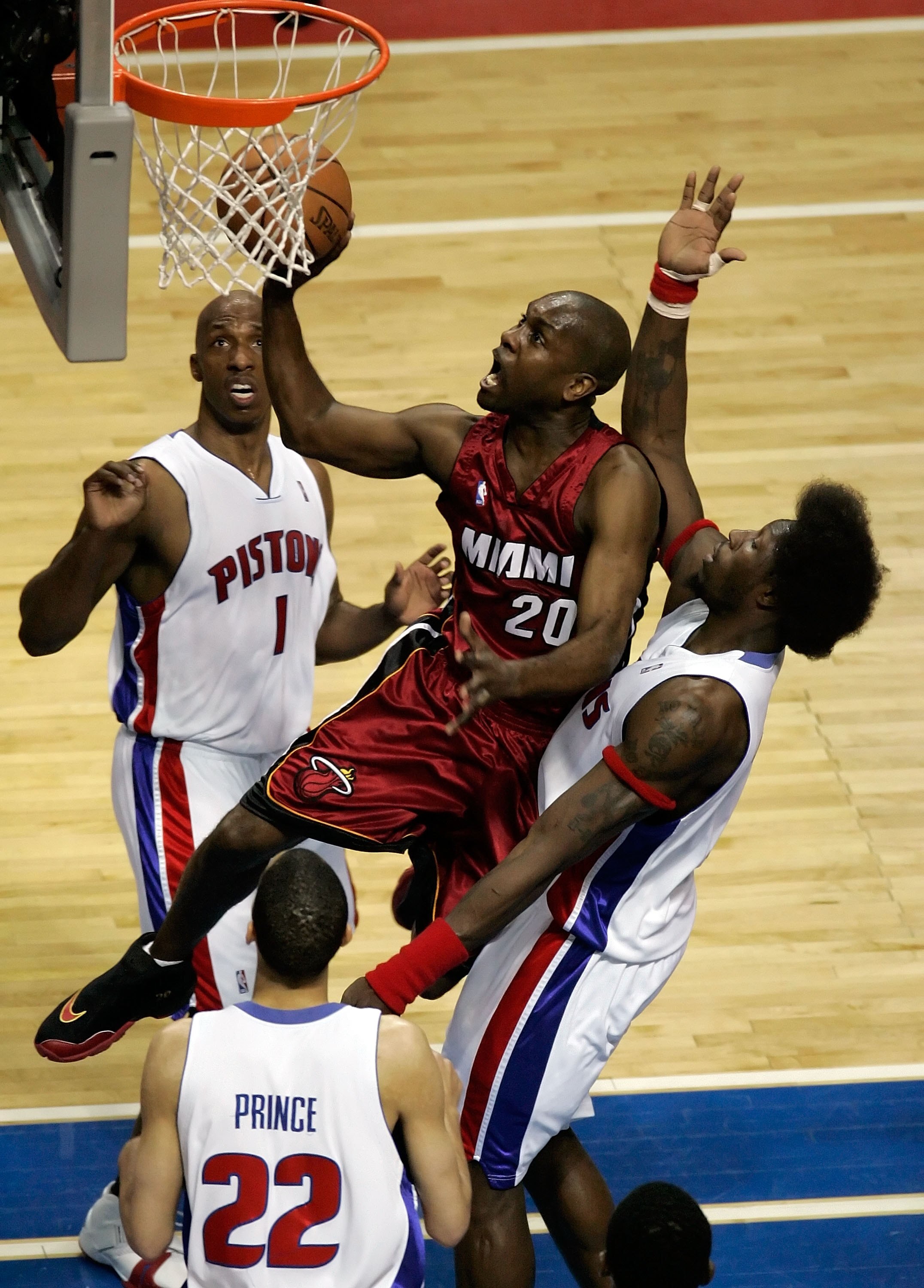 AUBURN HILLS, MI - MAY 23:  Gary Payton #20 of the Miami Heat shoots a layup in front of Ben Wallace #3 of the Detroit Pistons in game one of the Eastern Conference Finals during the 2006 NBA Playoffs on May 23, 2006 at the Palace of Auburn Hills in Aubur