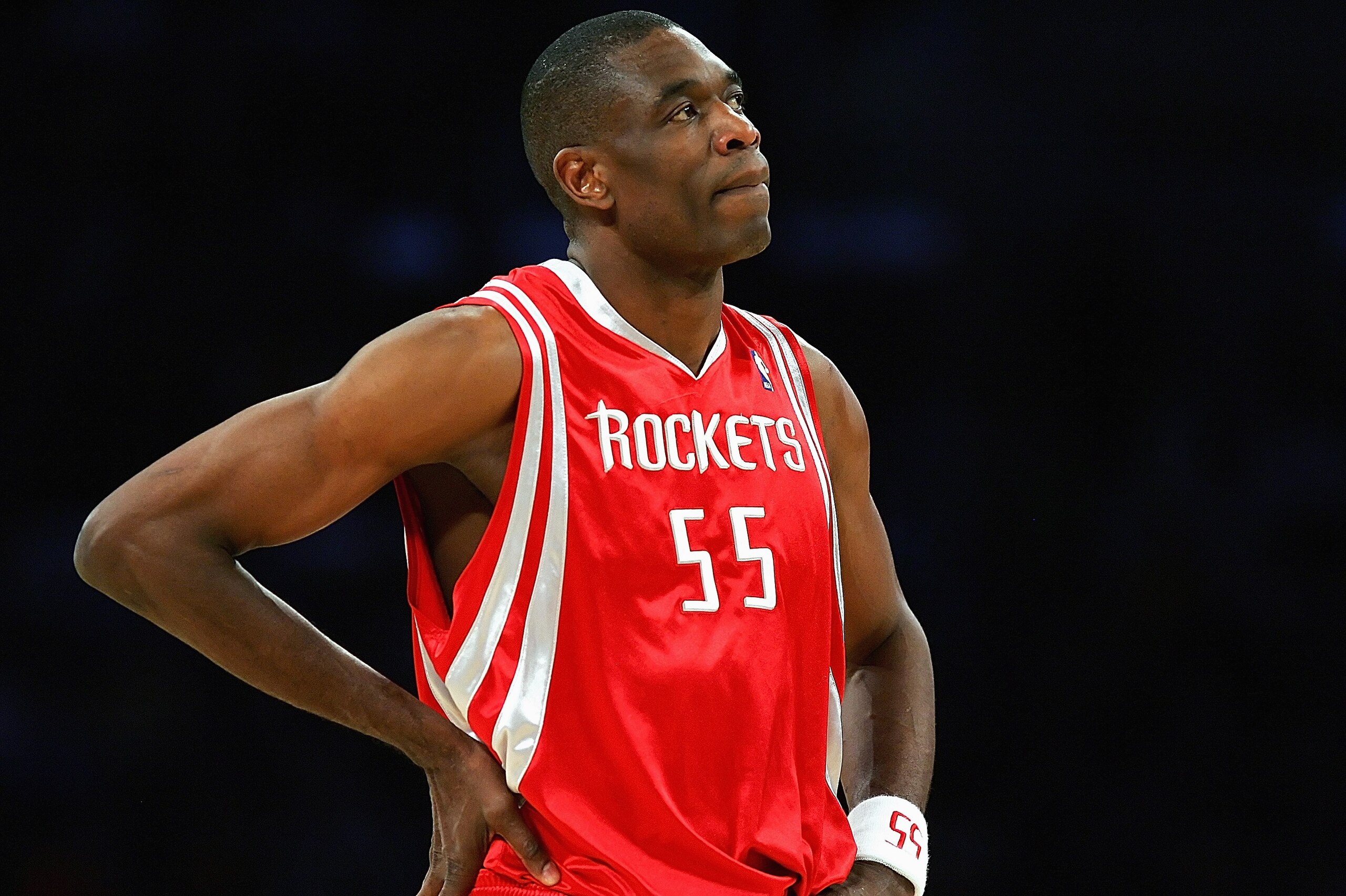 LOS ANGELES - MARCH 30:  Dikembe Mutombo #55 of the Houston Rockets looks on against the Los Angeles Lakers at Staples Center on March 30, 2007 in Los Angeles, California. The Rockets won 107-104. NOTE TO USER: User expressly acknowledges and agrees that,