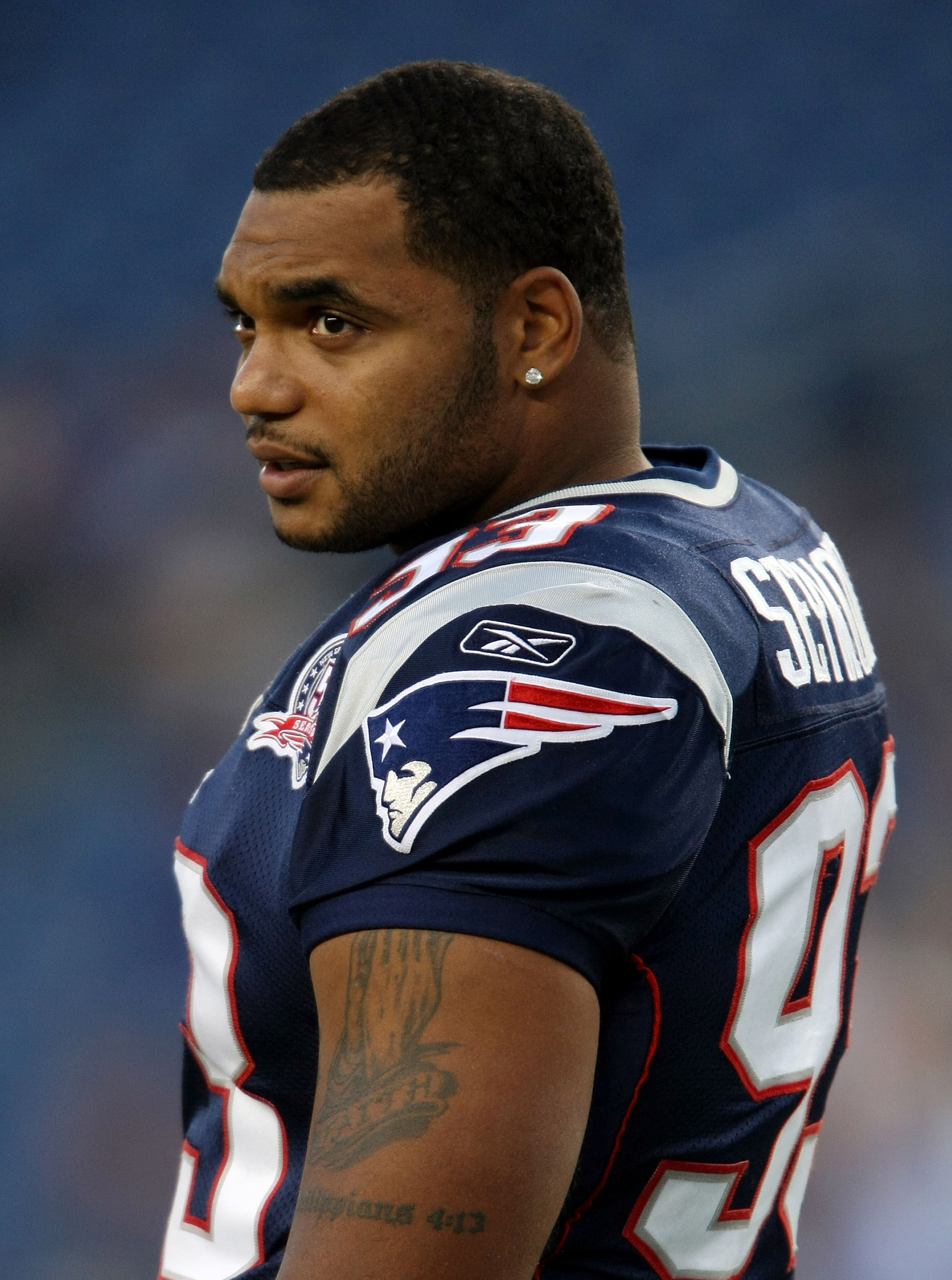 FOXBORO, MA - SEPTEMBER 03:  Richard Seymour #93 of the New England Patriots looks on before the game against the New York Giants on September 3, 2009 at Gillette Stadium in Foxboro, Massachusetts.  (Photo by Elsa/Getty Images)