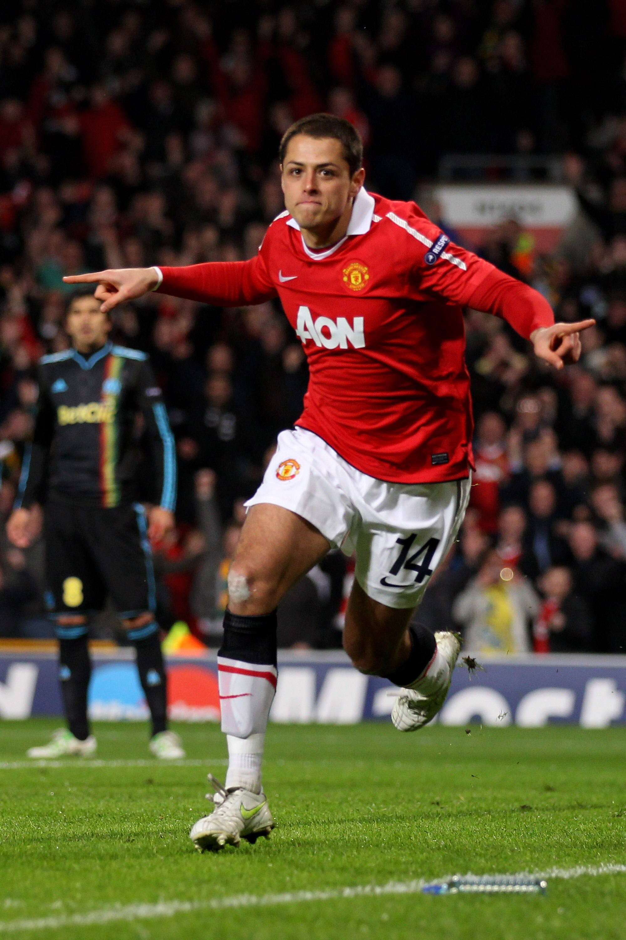 MANCHESTER, ENGLAND - MARCH 15:  Javier Hernandez of Manchester United celebrates scoring the opening goal during the UEFA Champions League round of 16 second leg match between Manchester United and Marseille at Old Trafford on March 15, 2011 in Mancheste
