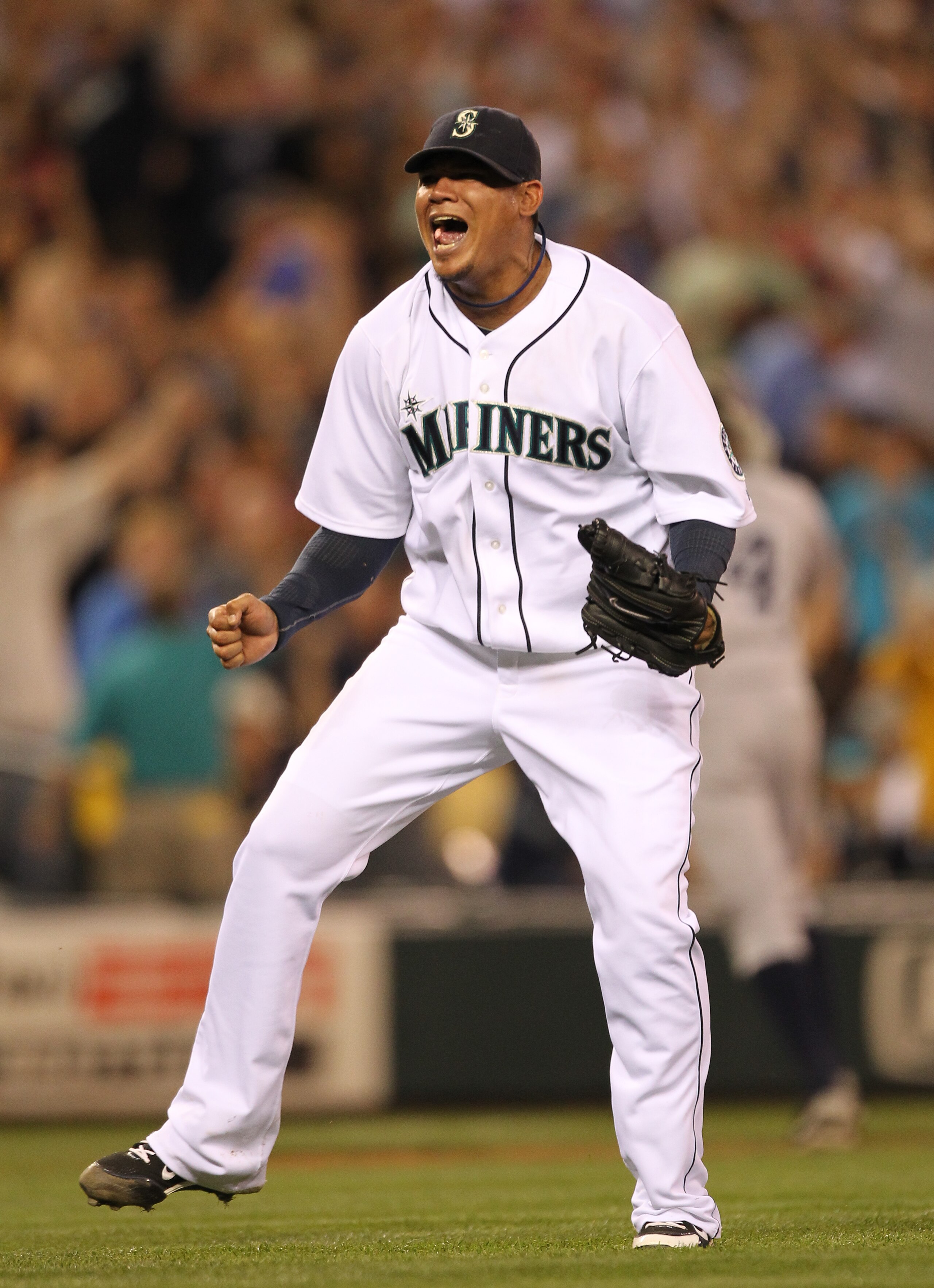 SEATTLE - JULY 10:  Starting pitcher Felix Hernandez #34 of the Seattle Mariners reacts after defeating the New York Yankees 4-1 at Safeco Field on July 10, 2010 in Seattle, Washington. (Photo by Otto Greule Jr/Getty Images)