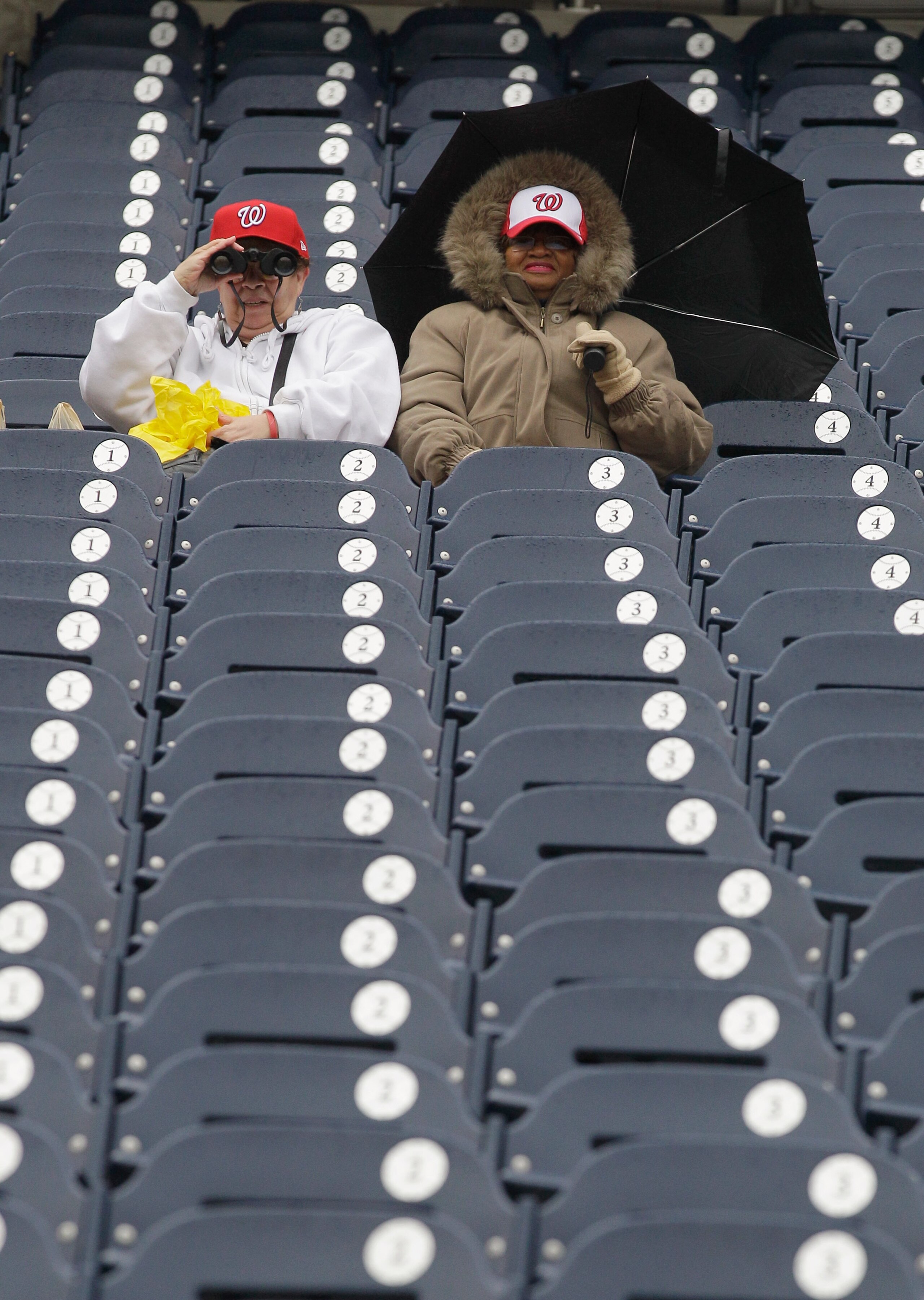 WASHINGTON, DC - MARCH 31: Washington Nationals fans watch batting practice before the start of opening day beteween the Nationals and Atlanta Braves  at Nationals Park on March 31, 2011 in Washington, DC.  (Photo by Rob Carr/Getty Images)