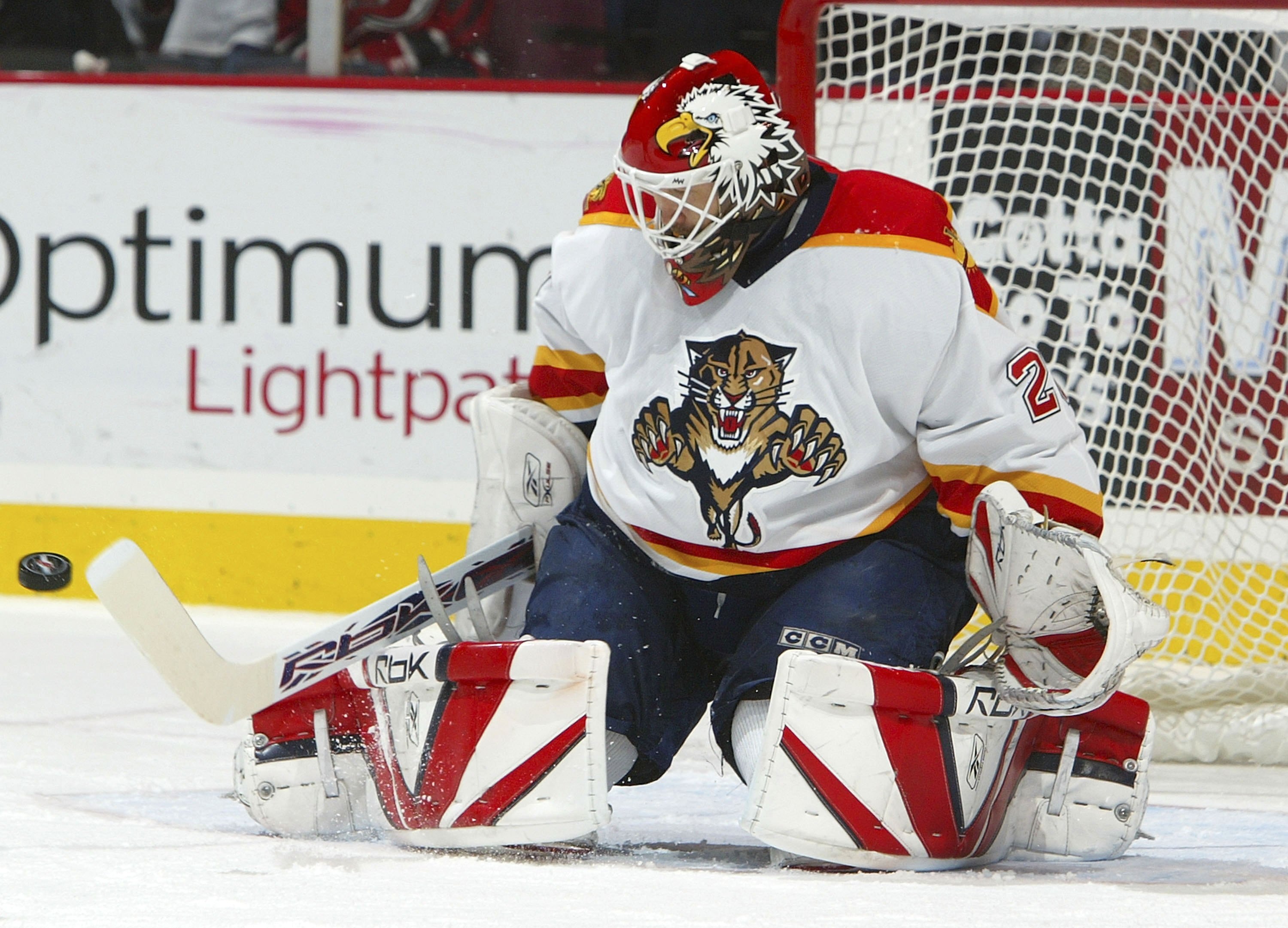 EAST RUTHERFORD, NJ - NOVEMBER 11:  Ed Belfour #20 of the Florida Panthers makes a save against the New Jersey Devils on November 11, 2006 at Continental Airlines Arena in East Rutherford, New Jersey.  (Photo by Jim McIsaac/Getty Images)