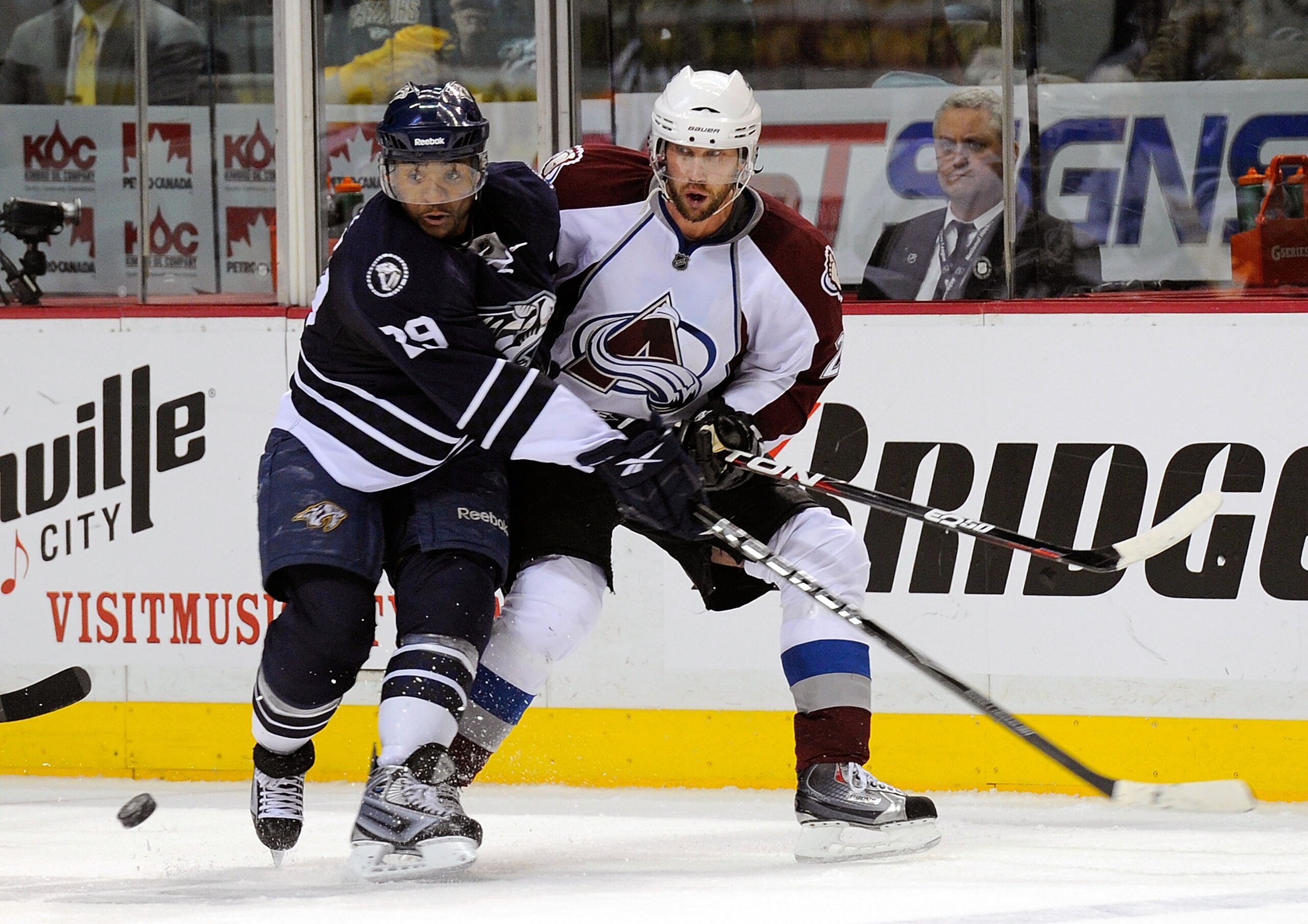 NASHVILLE, TN - FEBRUARY 12:  Peter Forsberg #21 of the Colorado Avalanche skates against Joel Ward #29 of the Nashville Predators on February 12, 2011 at the Bridgestone Arena in Nashville, Tennessee.  (Photo by Frederick Breedon/Getty Images)