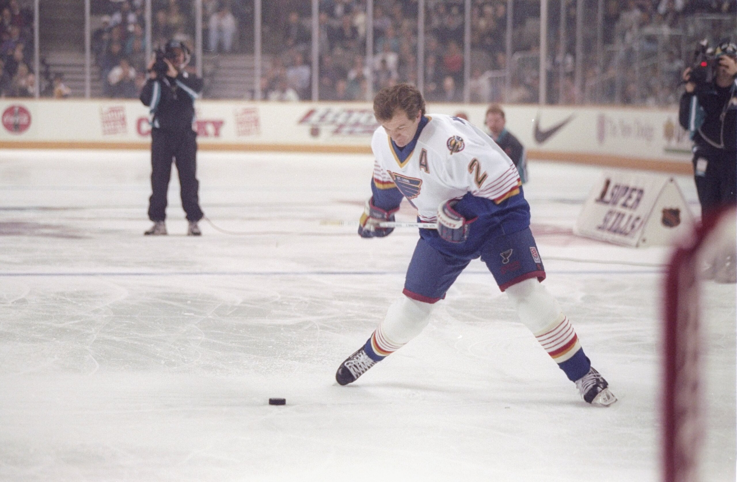 17 Jan 1997: Defenseman Al MacInnis of the St. Louis Blues fires the hardest shot during the NHL Super-Skills Competition at the San Jose Arena in San Jose, California.