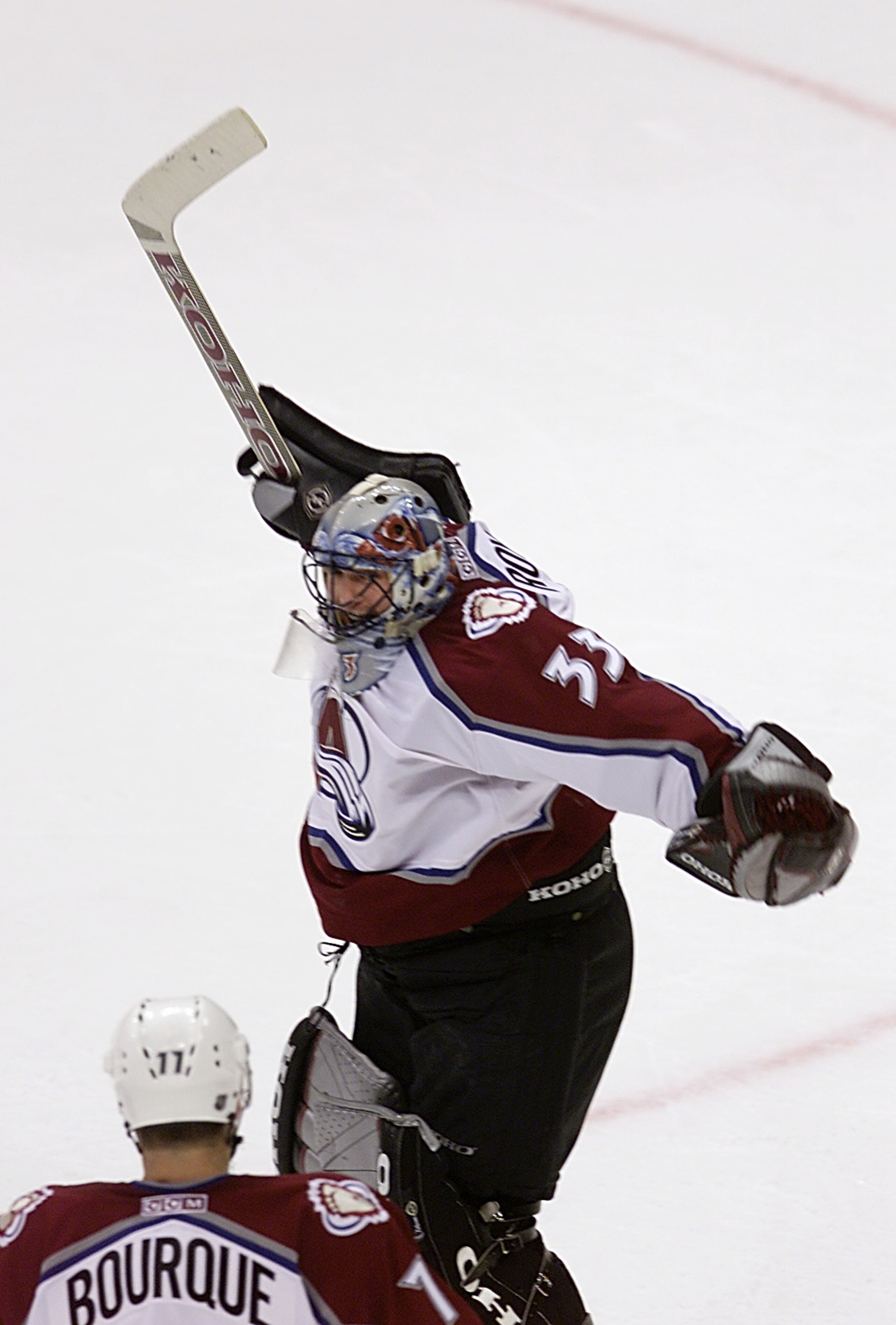 9 Jun 2001:  Goalie Patrick Roy #33 of the Colorado Avalanche jumps into the air and into the arms of Ray Bourque #77 as time expires giving them the 2001 NHL Stanley Cup Championship in Denver, Colorado.  DIGITAL IMAGE Mandatory Credit: Brian Bahr/ALLSPO