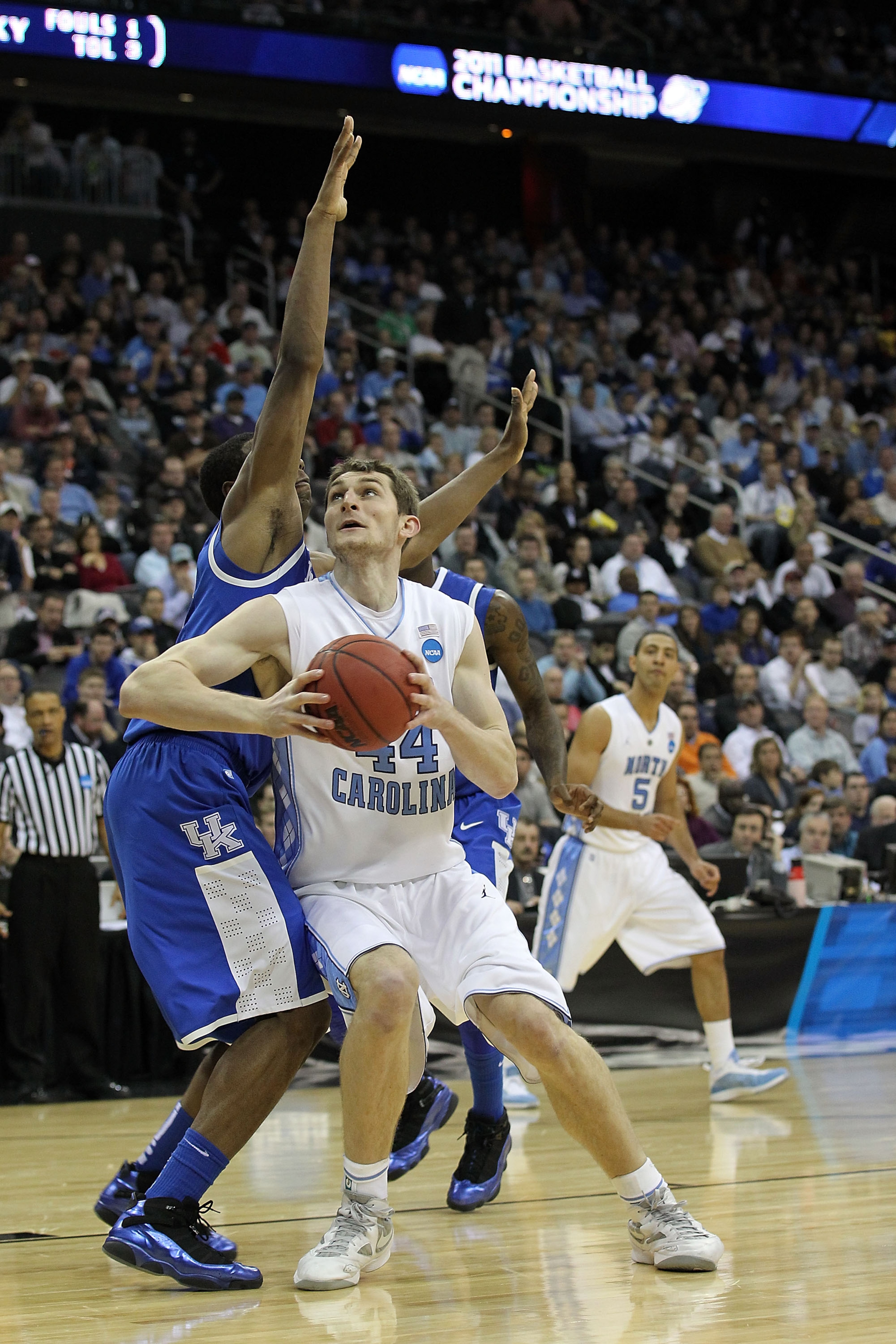 NEWARK, NJ - MARCH 27: Tyler Zeller #44 of the North Carolina Tar Heels in action against Terrence Jones #3 of the Kentucky Wildcats during the east regional final of the 2011 NCAA men's basketball tournament at Prudential Center on March 27, 2011 in New NEWARK, NJ - MARCH 27: Tyler Zeller #44 of the North Carolina Tar Heels in action against Terrence Jones #3 of the Kentucky Wildcats during the east regional final of the 2011 NCAA men's basketball tournament at Prudential Center on March 27, 2011 in New