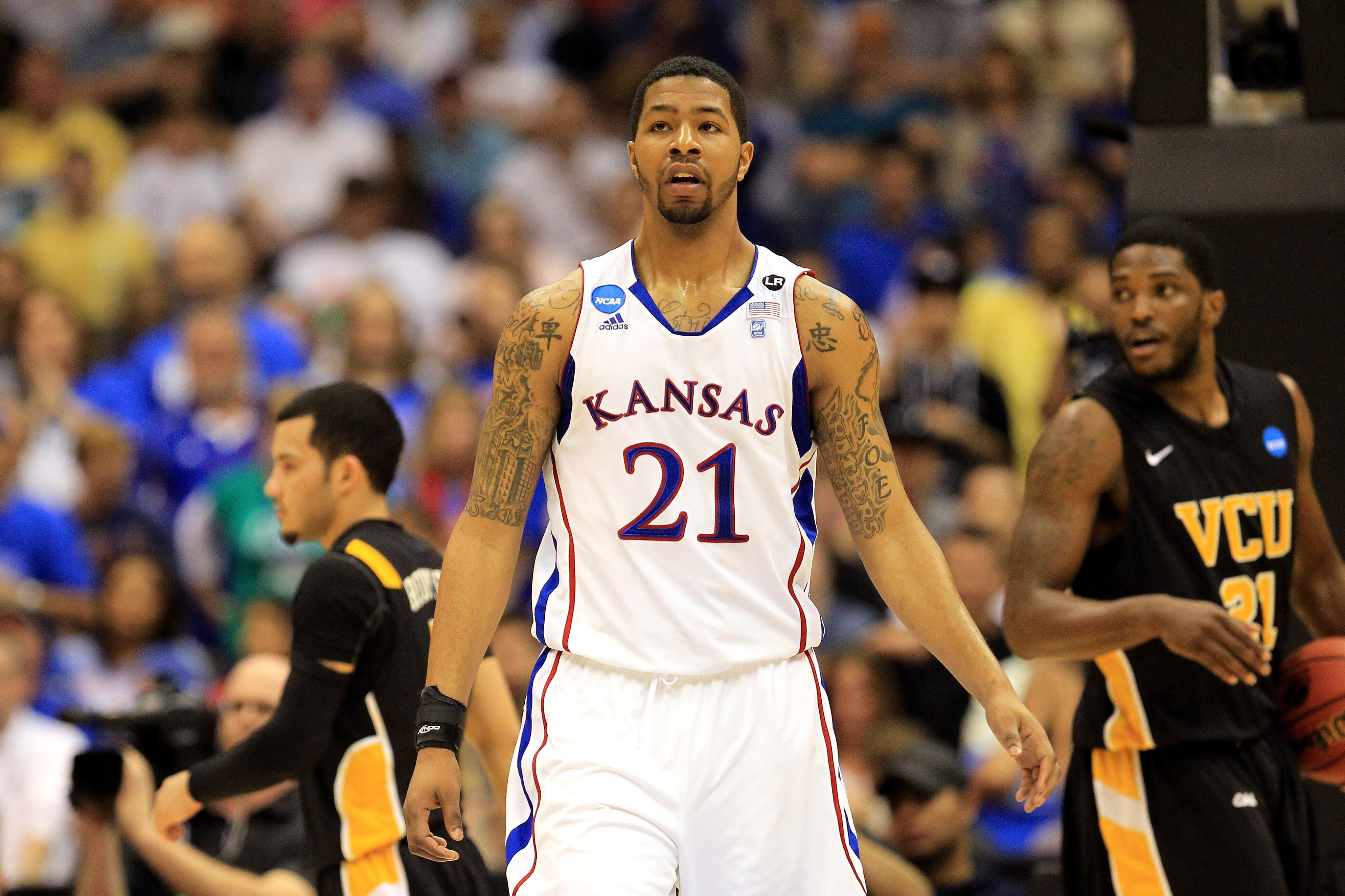 SAN ANTONIO, TX - MARCH 27:  Markieff Morris #21 of the Kansas Jayhawks reacts during the southwest regional final of the 2011 NCAA men's basketball tournament against the Virginia Commonwealth Rams at the Alamodome on March 27, 2011 in San Antonio, Texas