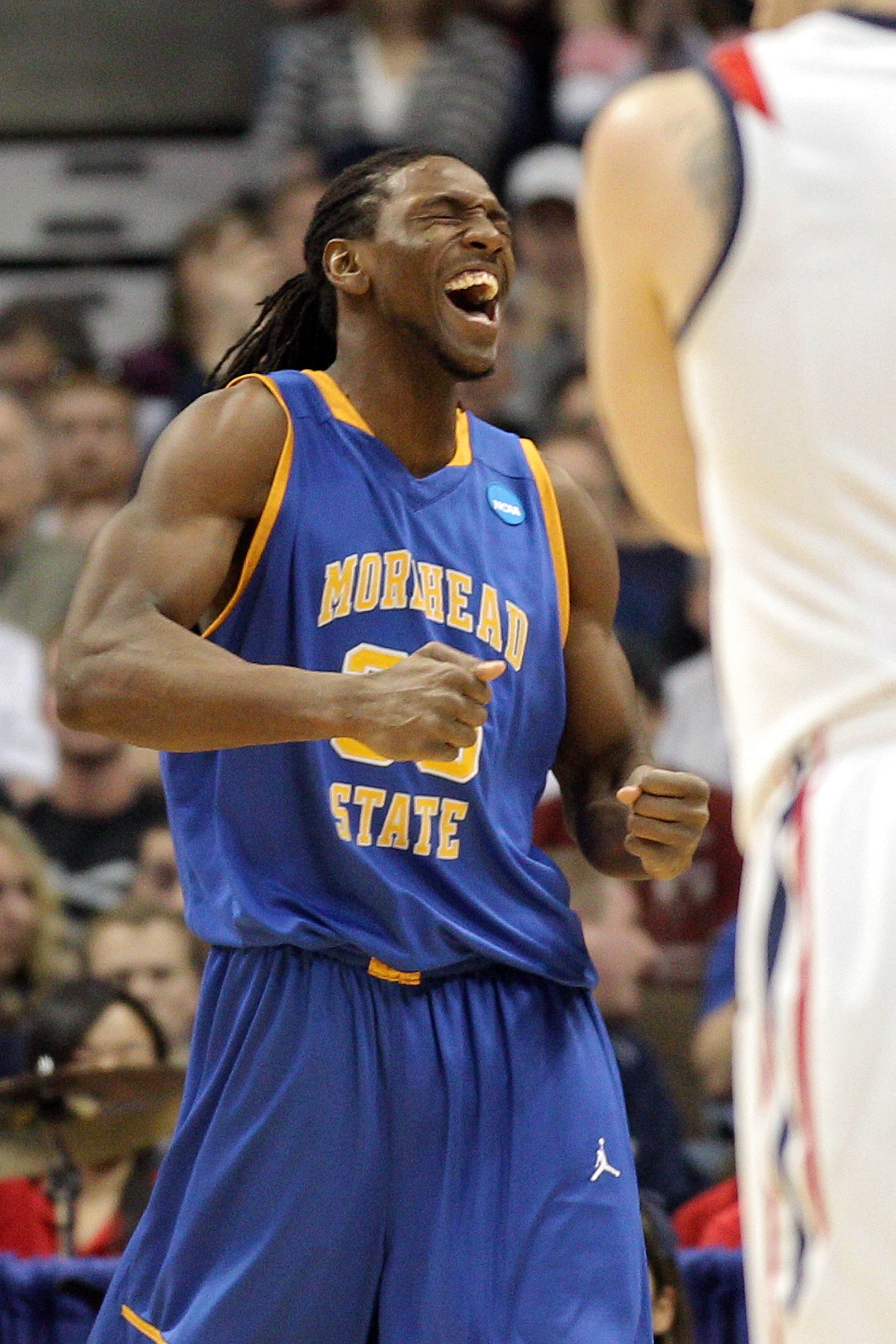 DENVER, CO - MARCH 19:  Kenneth Faried #35 of the Morehead State Eagles dunks reacts after a play against the Richmond Spiders during the third round of the 2011 NCAA men's basketball tournament at Pepsi Center on March 19, 2011 in Denver, Colorado.  (Pho