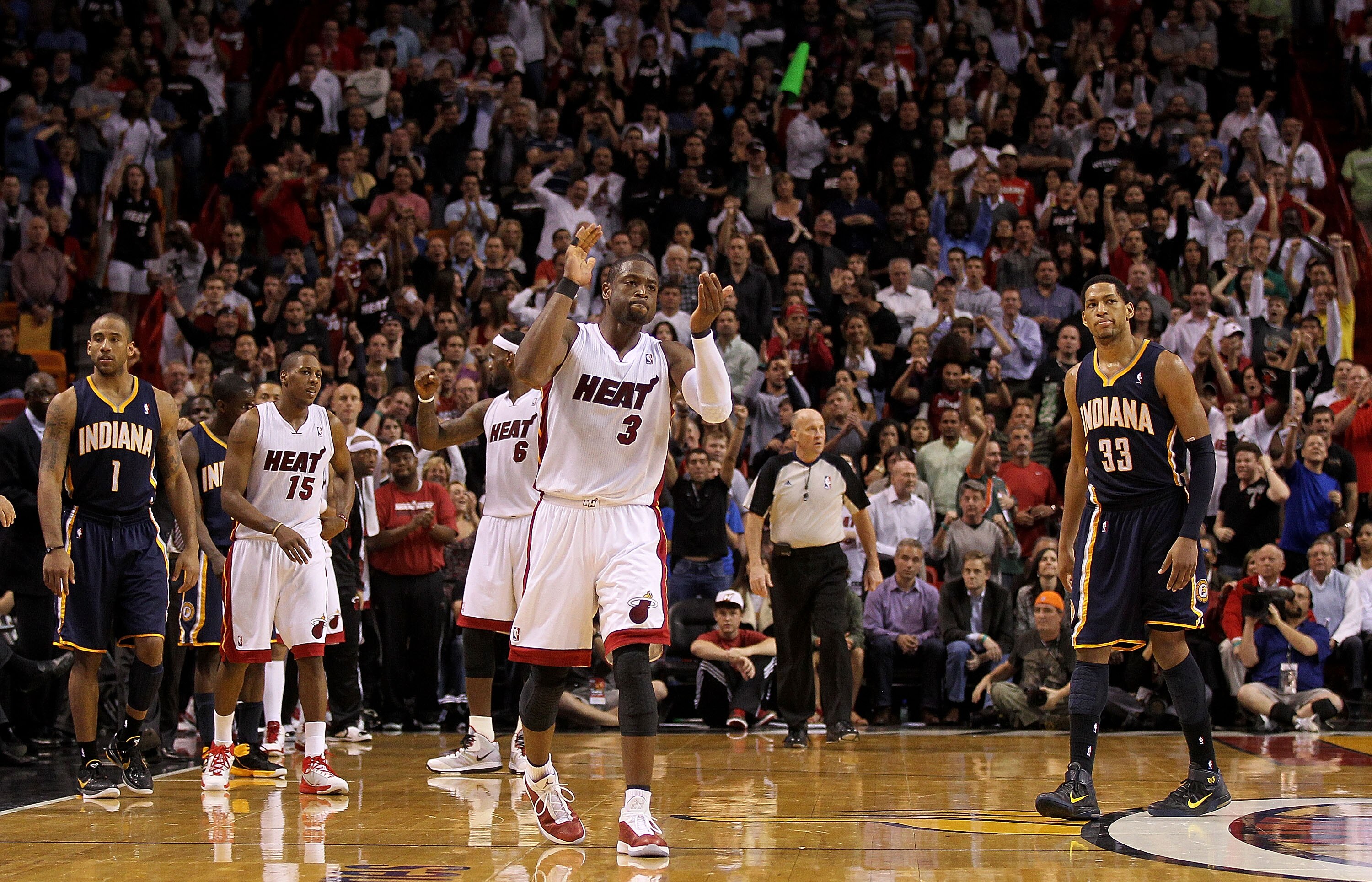 MIAMI, FL - FEBRUARY 08:  Dwyane Wade #3 of the Miami Heat reacts after forcing a late game turnover during a game against the Indiana Pacers at American Airlines Arena on February 8, 2011 in Miami, Florida. NOTE TO USER: User expressly acknowledges and a