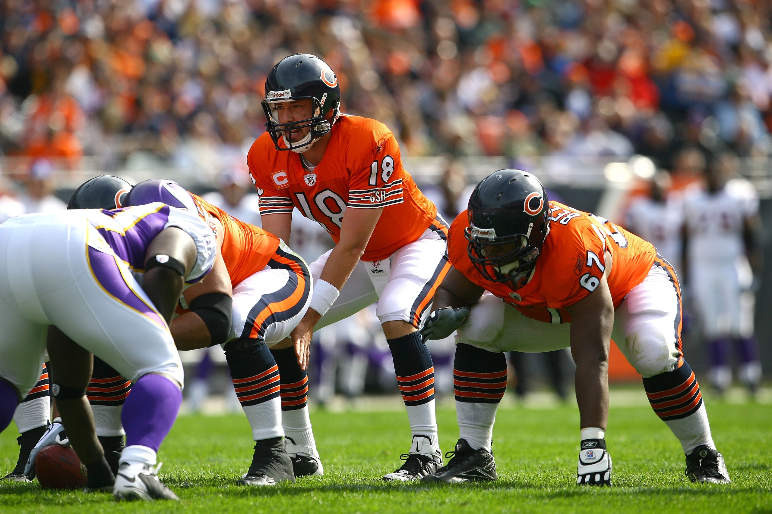 CHICAGO - OCTOBER 19:  Kyle Orton #18 of the Chicago Bears calls out signals as he stands under center at the line of scrimmage against the Minnesota Vikings at Soldier Field on October 19, 2008 in Chicago, Illinois.  (Photo by Jeff Gross/Getty Images)