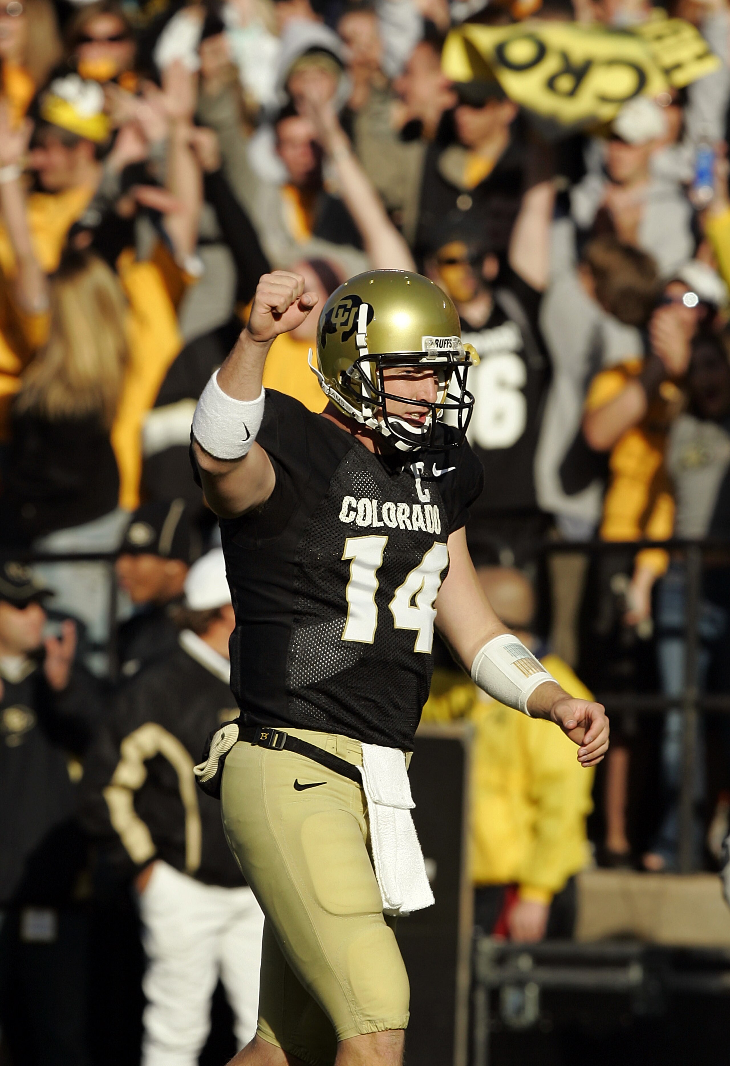BOULDER, CO - NOVEMBER 5:  Quarterback Joel Klatt #14 of the Colorado Buffaloes celebrates a touchdown against the Missouri Tigers in the second quarter on October 5, 2005 at Folsom Field in Boulder, Colorado.  Colorado won 41-12.  (Photo by Brian Bahr/Ge