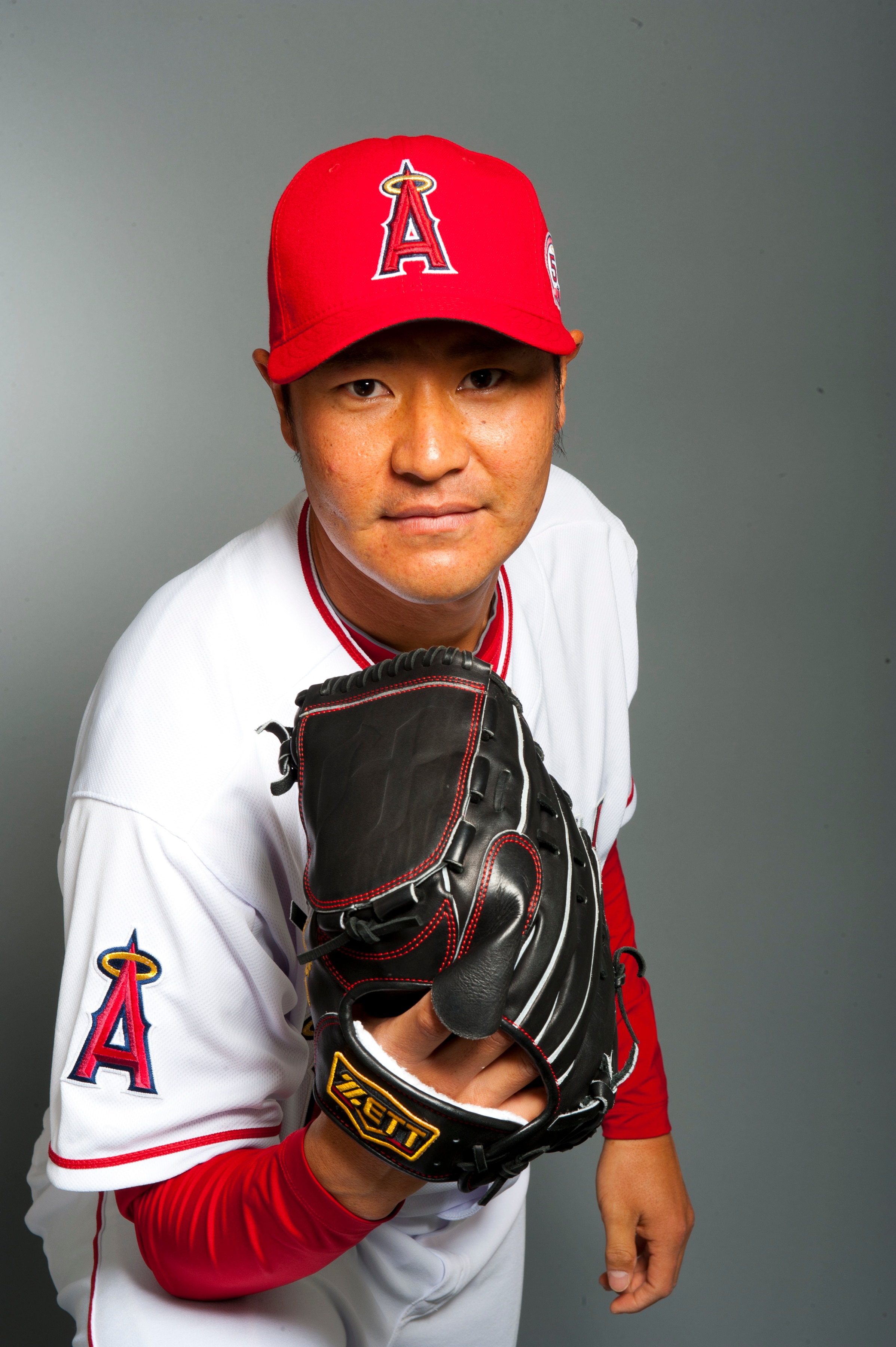 TEMPE, AZ - FEBRUARY 21: Hisanori Takahashi #21 of the Los Angeles Angels of Anaheim poses during their photo day at Tempe Diablo Stadium on February 21, 2011 in Tempe, Arizona.  (Photo by Rob Tringali/Getty Images)